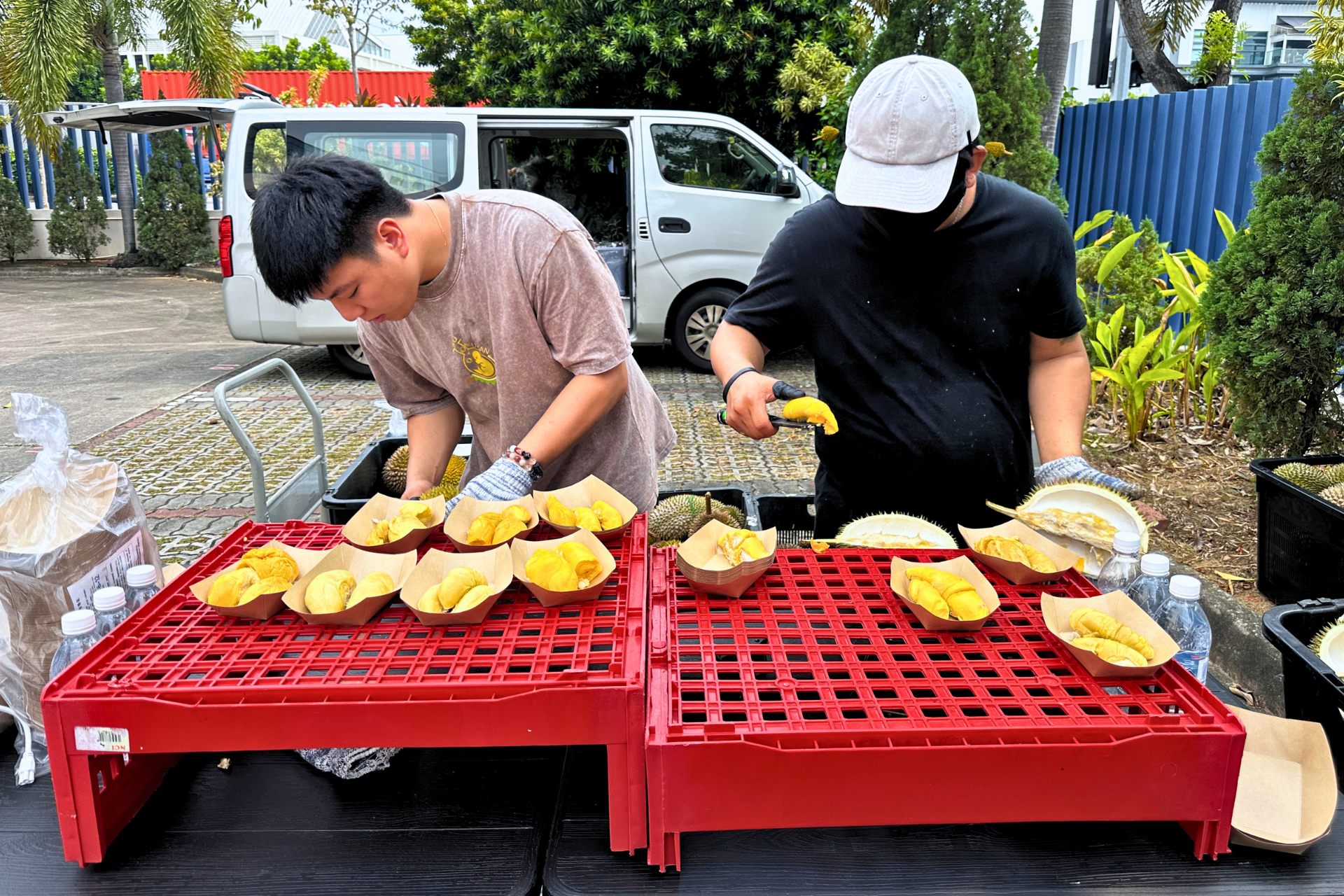 Durian masters at off-site durian party event.png