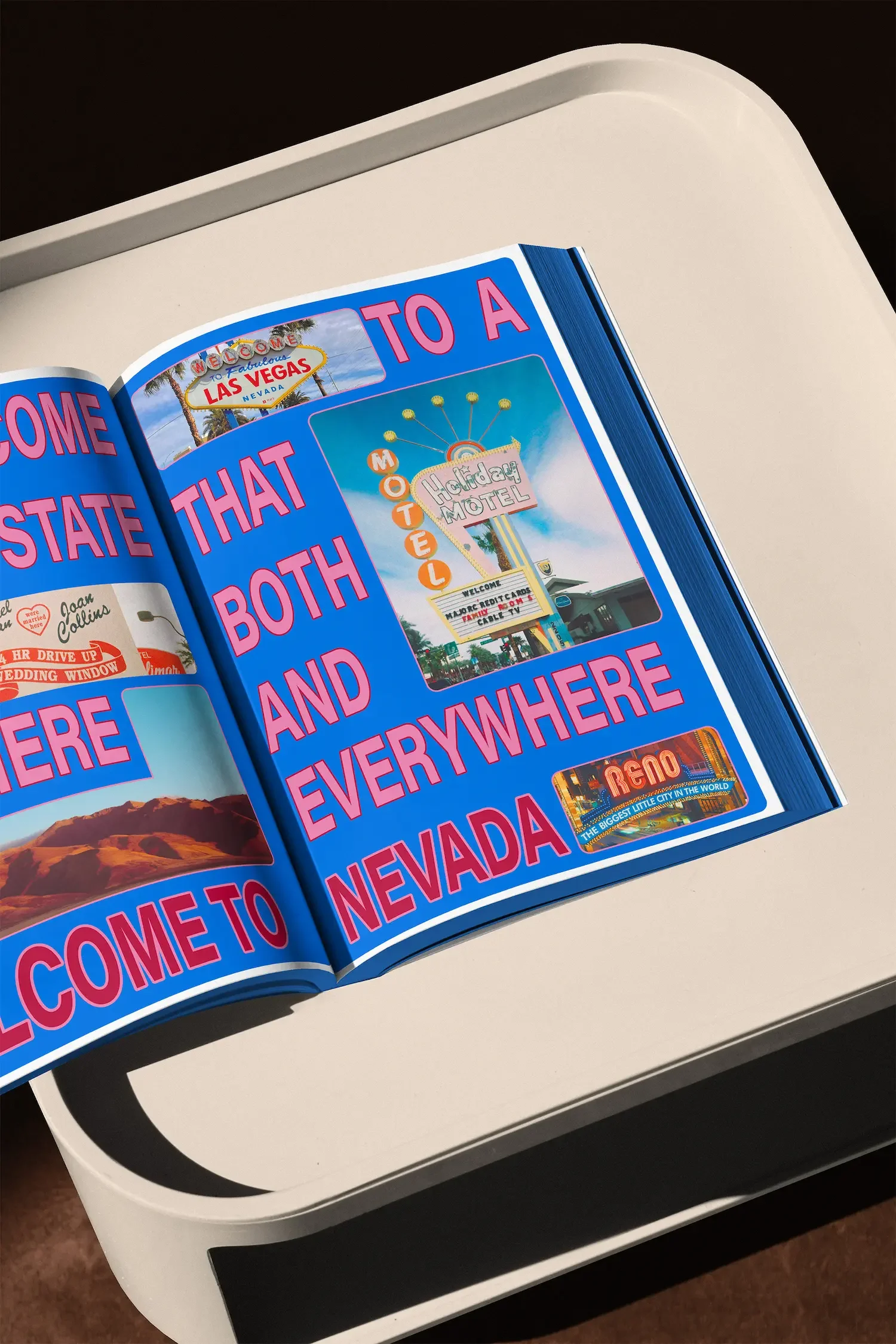 Page from a book or magazine with images of road signs and advertisements, mentioning Las Vegas, a motel, and a city called Reno, with a bright blue background and pink text.