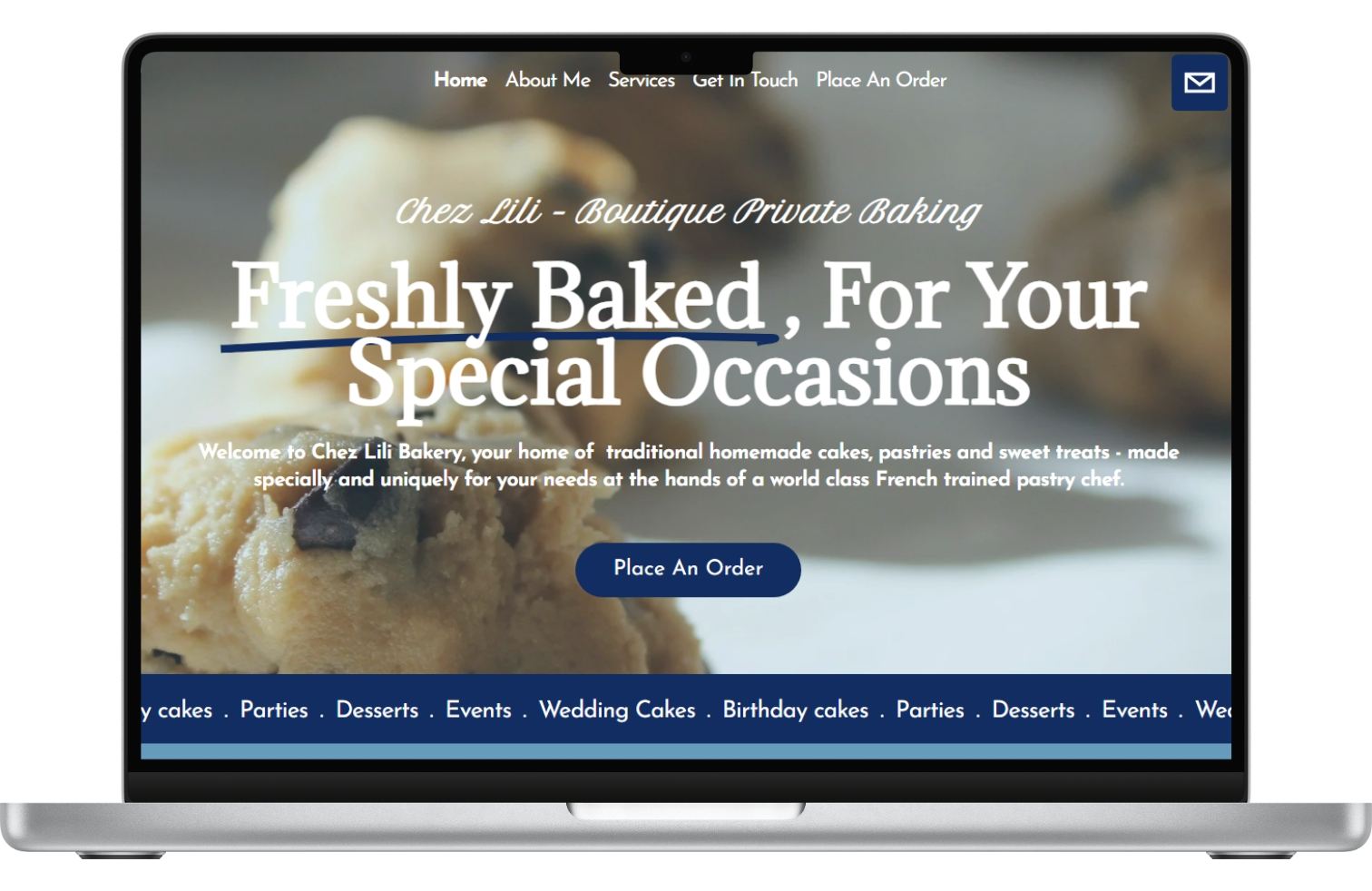 Screenshot of a bakery website homepage displaying a close-up image of a chocolate chip cookie, with menu options at the top and a central heading that says 'Freshly Baked, For Your Special Occasions', along with a button labeled 'Place An Order'.