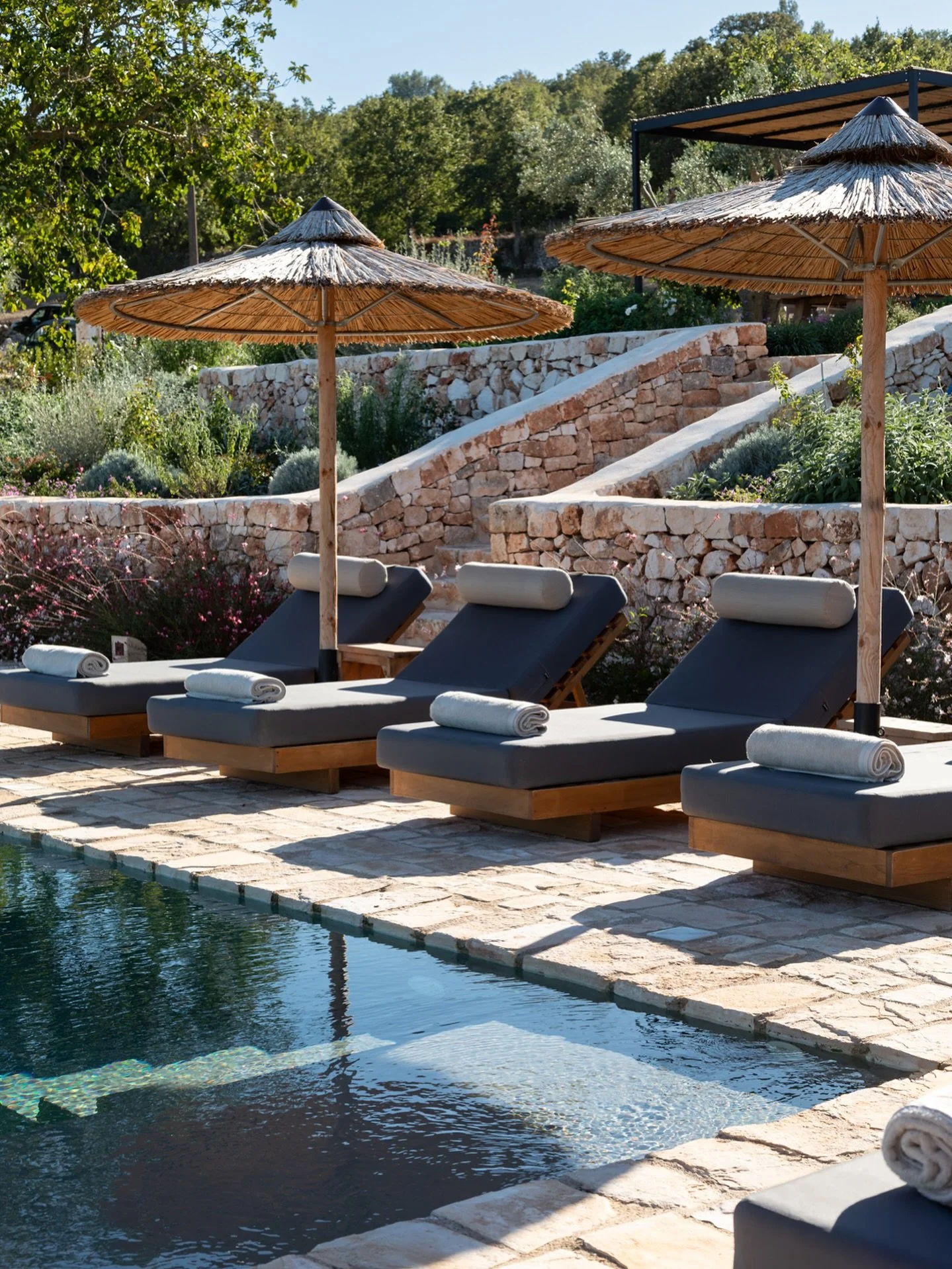 Location Y. Now live on our website. An immaculate interior of Pugliese charm set in 8 Trullo cones. A seriously beautiful and mature garden, views across the countryside of olive groves and vineyards. An infinity pool with broad terraces. Particular