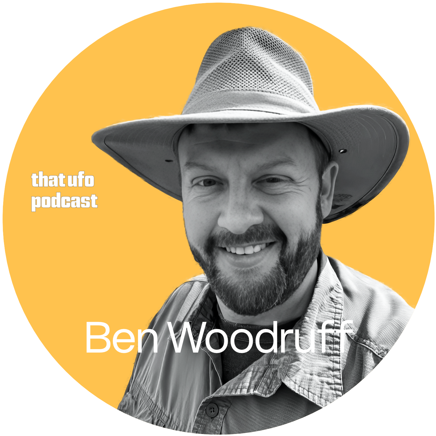 A black-and-white photo of Ben Woodruff wearing a wide-brimmed hat, smiling at the camera, with a yellow background. Text on the image reads 'that ufo podcast' and 'Ben Woodruff'.