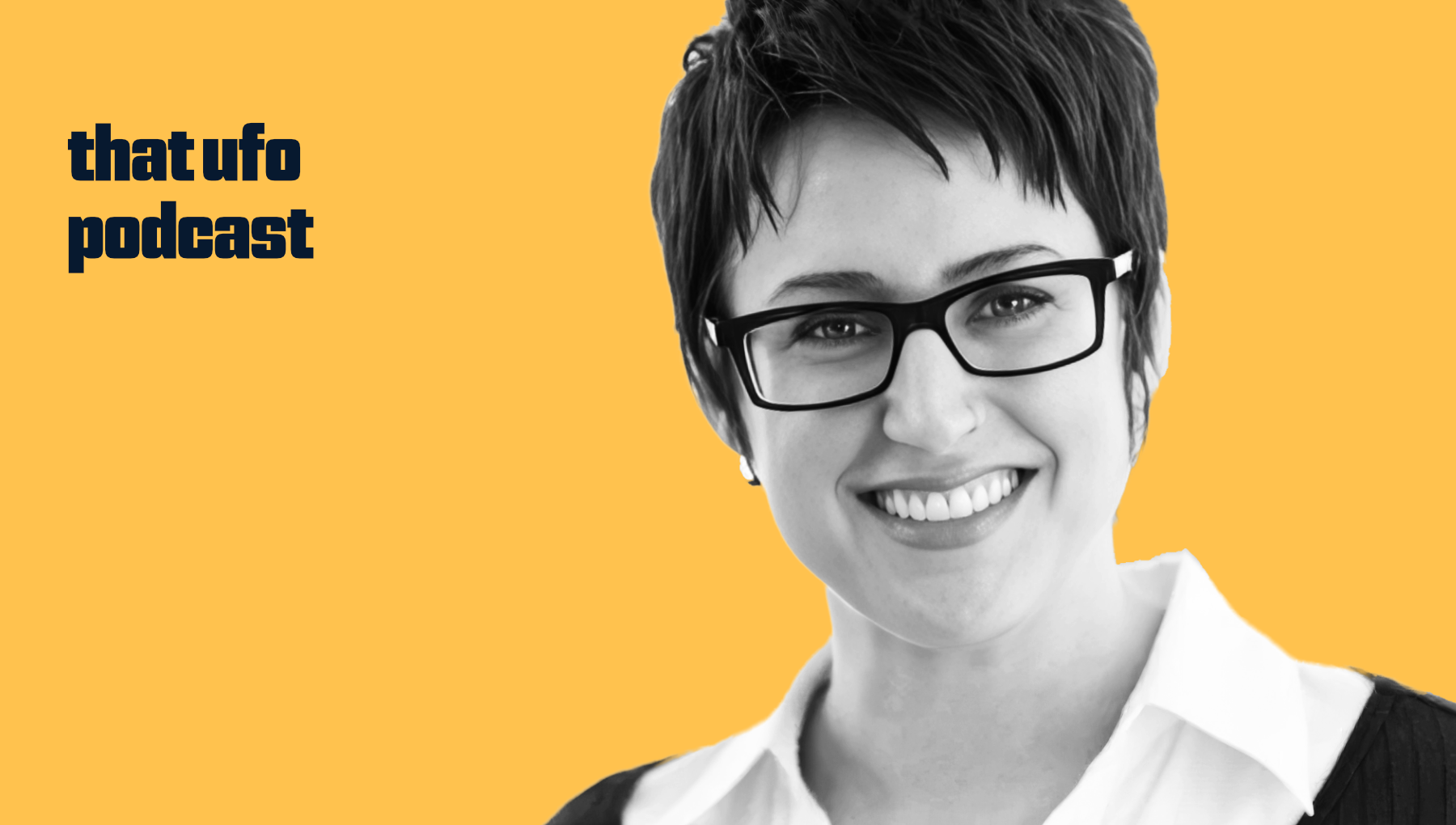 A smiling woman with short dark hair, wearing glasses, a white shirt, and a black sweater, against an orange background. Text on the left side reads 'that ufo podcast'.