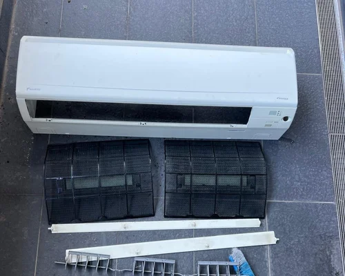Split-system air conditioner opened for maintenance