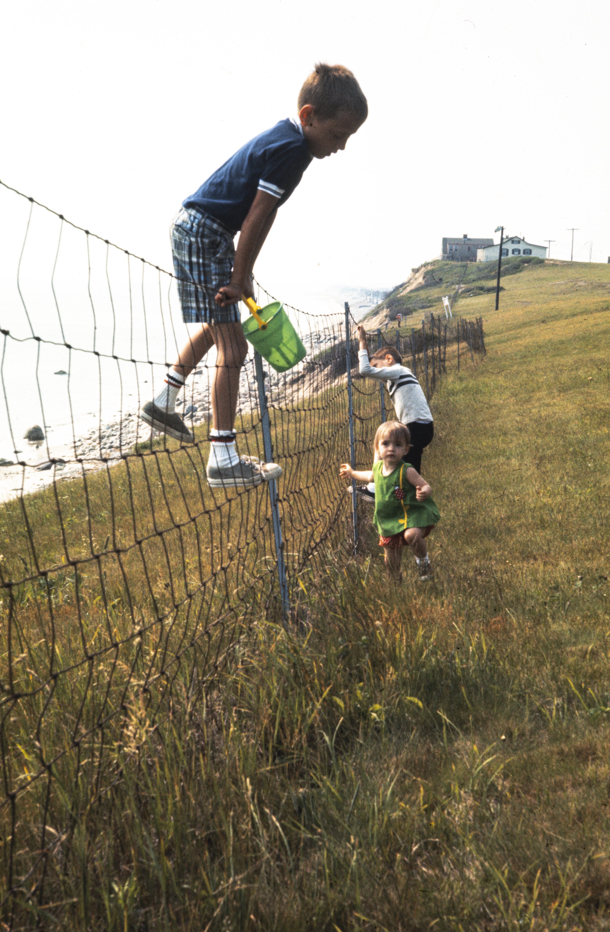 Strong summer vacation energy. Somewhere on Cape Cod, most likely. The kind of chaos you only get when no one’s in charge—but everyone’s fine. | Found 35mm slide, 1970s.