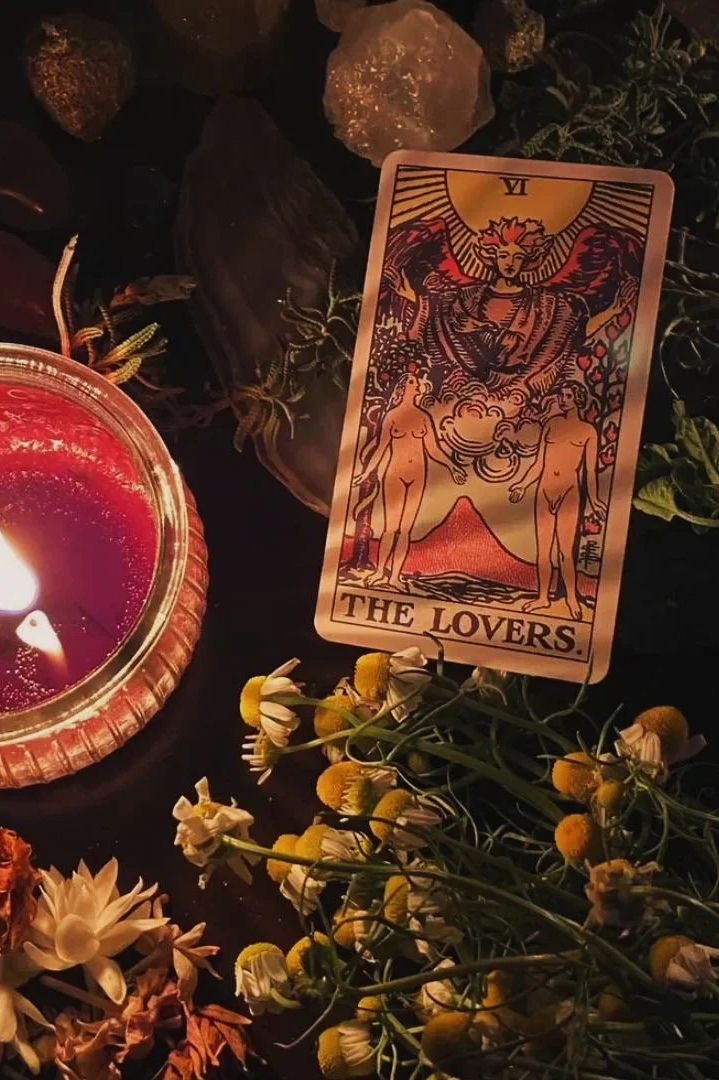 reading tarot cards and learning about their meanings in order to gain deeper understanding of self, and using the cards to enhance and connect more deeply to intuition