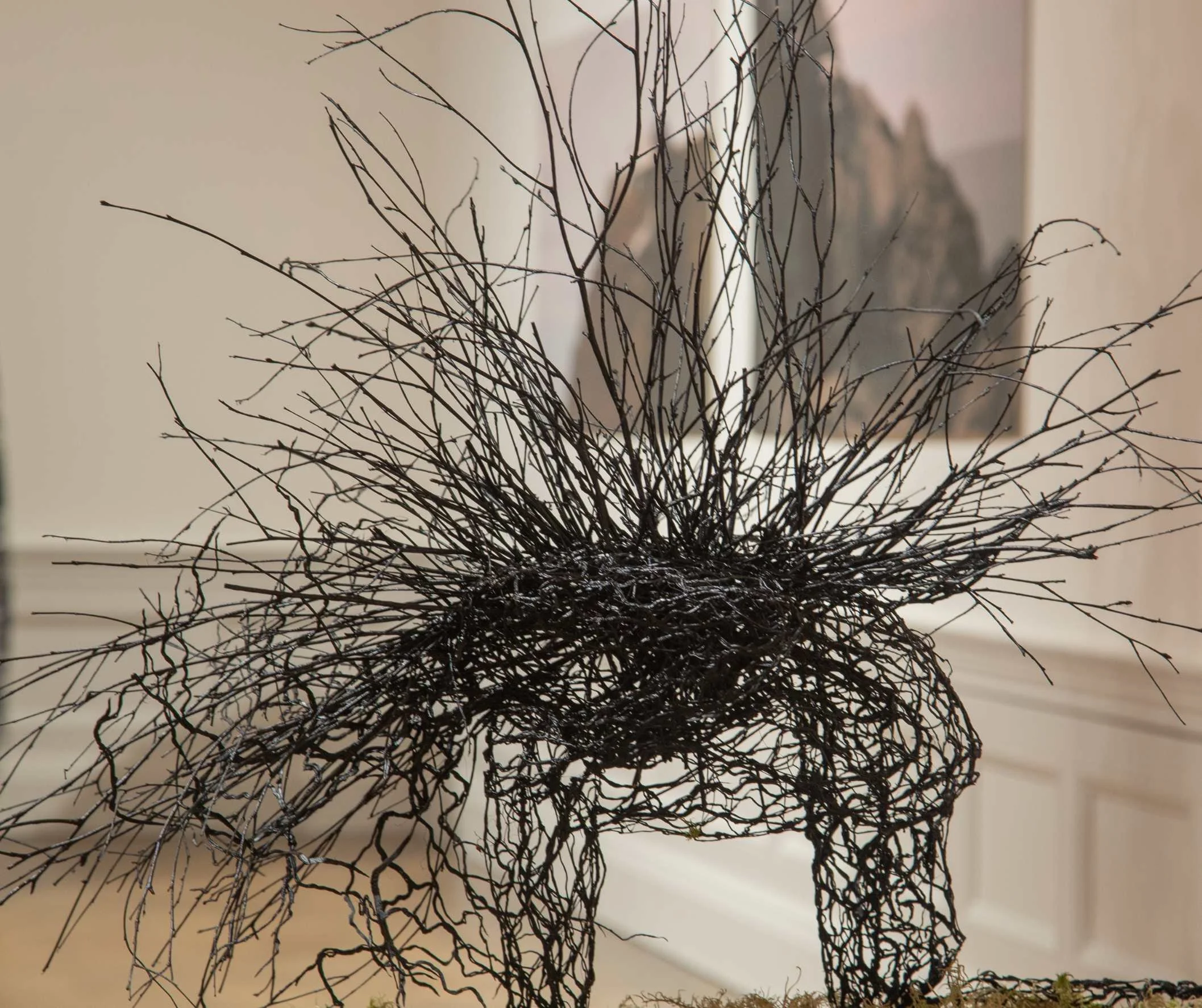 PATRIC ROGERS PENITENT (2024) 

PLA filament and moss 

A knight kneels, a frozen moment of transformation. ‘Penitent’ reflects the inner struggle Gawain faced before the Green Knight. Chivalry is not bound by steel or oath alone, but by the soil ben