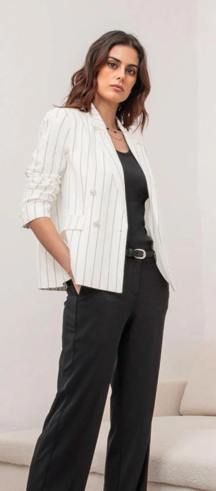 Elora white pinstripe suit and black trousers