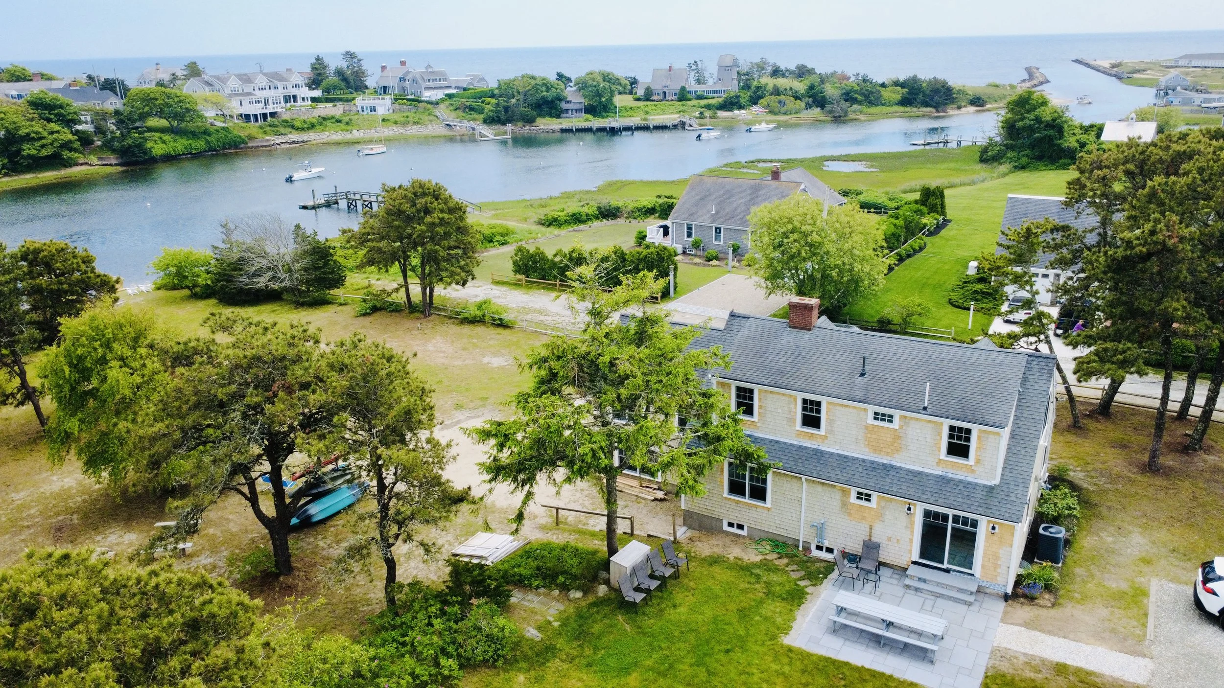 Cape Cod Vacation Rental Management | Tuxfin Hospitality Property - Dog-Friendly Waterfront Harwich Home for Short Term Bookings - Save Money over Airbnb & VRBO - Homeowners Rent Second Homes for Extra Income. 