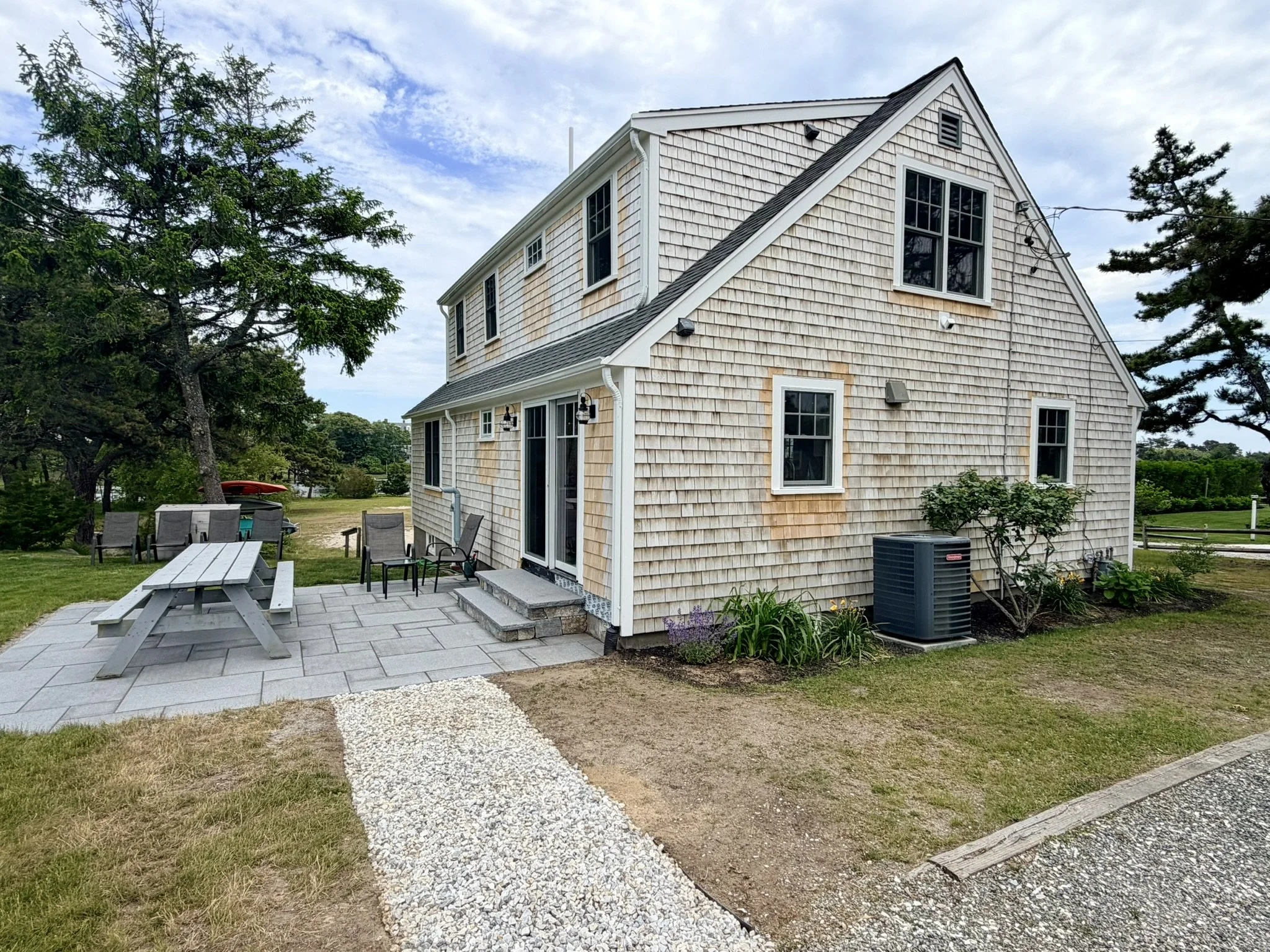 Cape Cod Vacation Rental Management | Tuxfin Hospitality Property - Dog-Friendly Waterfront Harwich Home for Short Term Bookings - Save Money over Airbnb & VRBO - Homeowners Rent Second Homes for Extra Income. 