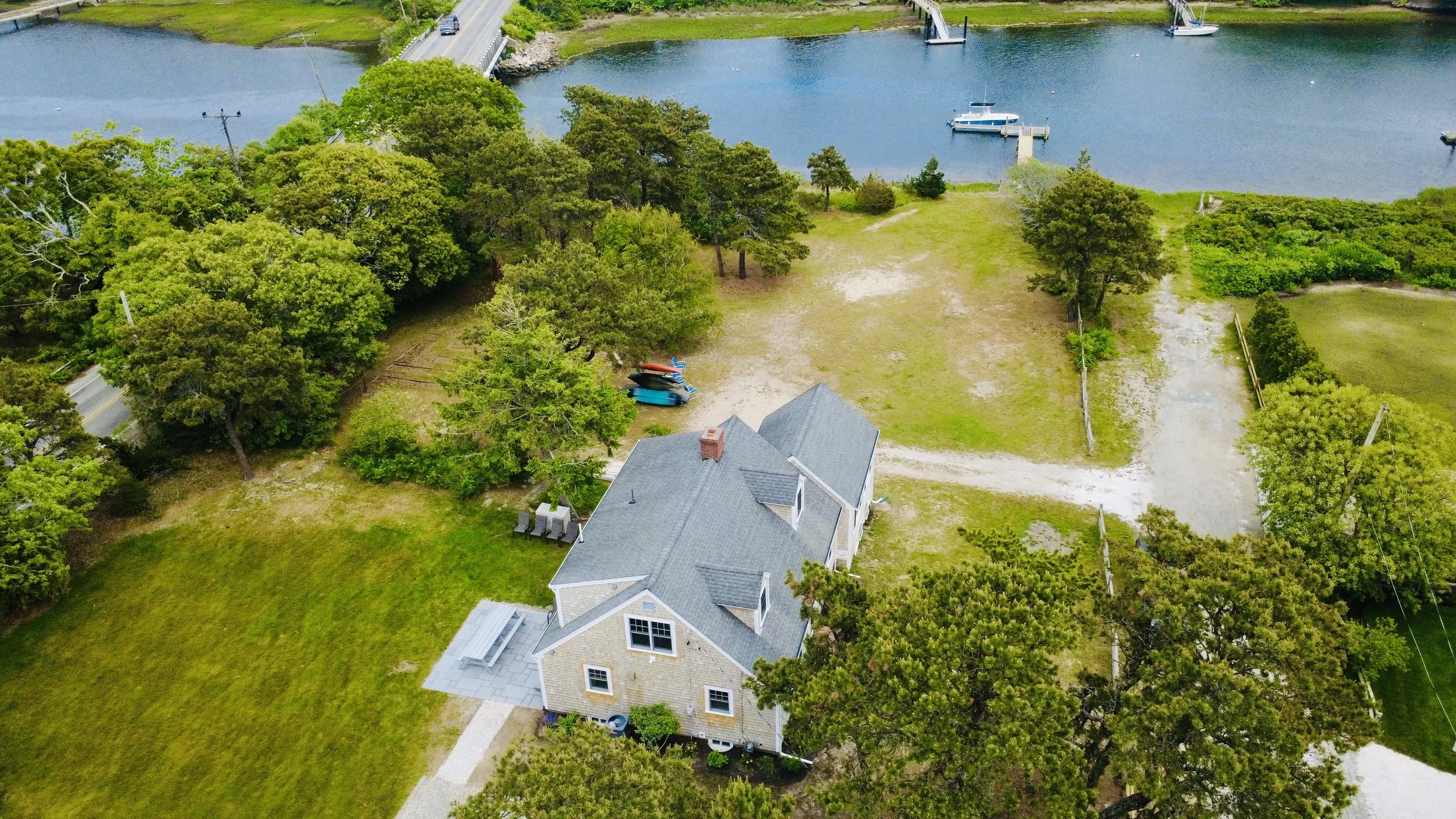 Cape Cod Vacation Rental Management | Tuxfin Hospitality Property - Dog-Friendly Waterfront Harwich Home for Short Term Bookings - Save Money over Airbnb & VRBO - Homeowners Rent Second Homes for Extra Income. 
