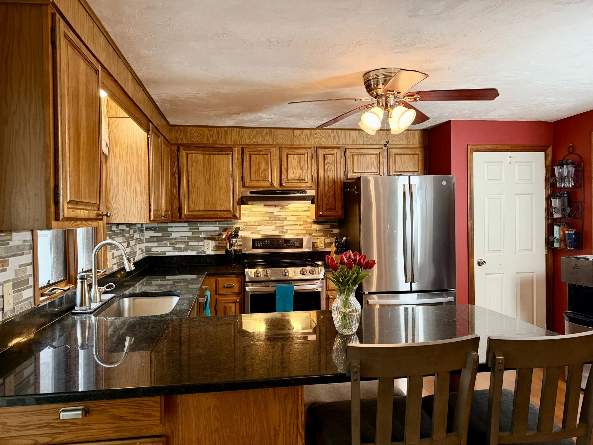 Cape Cod Vacation Rental Management | Tuxfin Hospitality Property - Dog-Friendly Yarmouth Home for Short Term Bookings - Save Money over Airbnb & VRBO - Homeowners Rent Second Homes for Extra Income. Dining Area