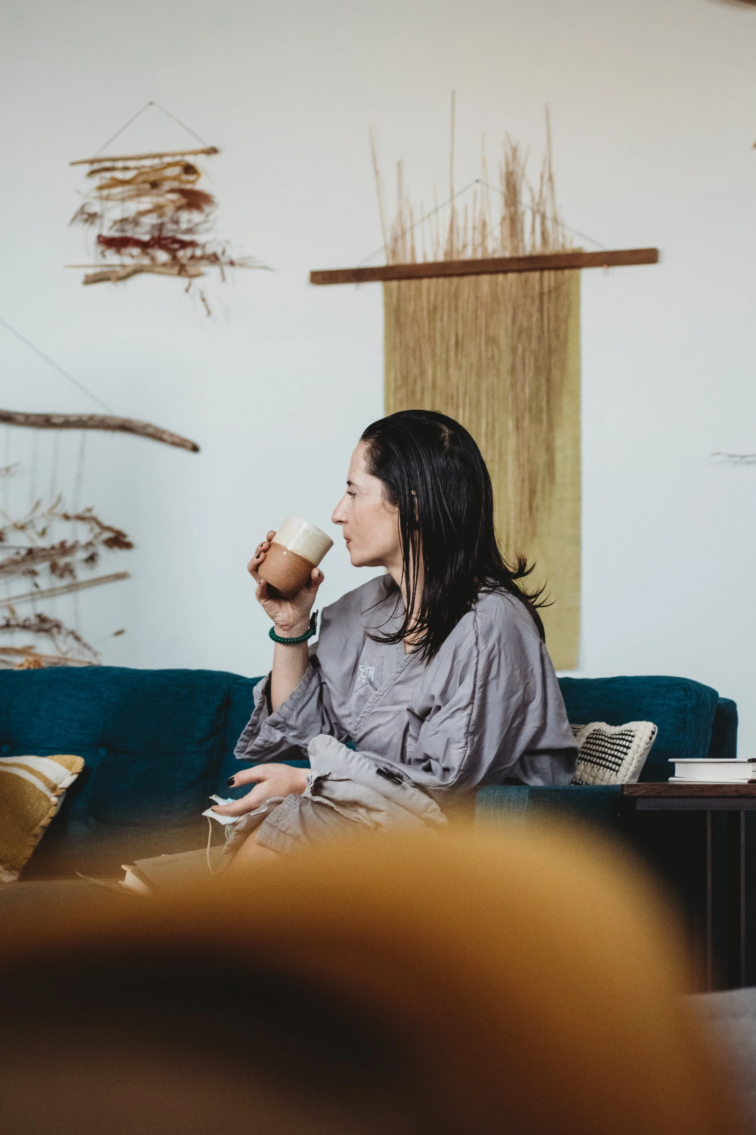 guest drinking tea in lounge