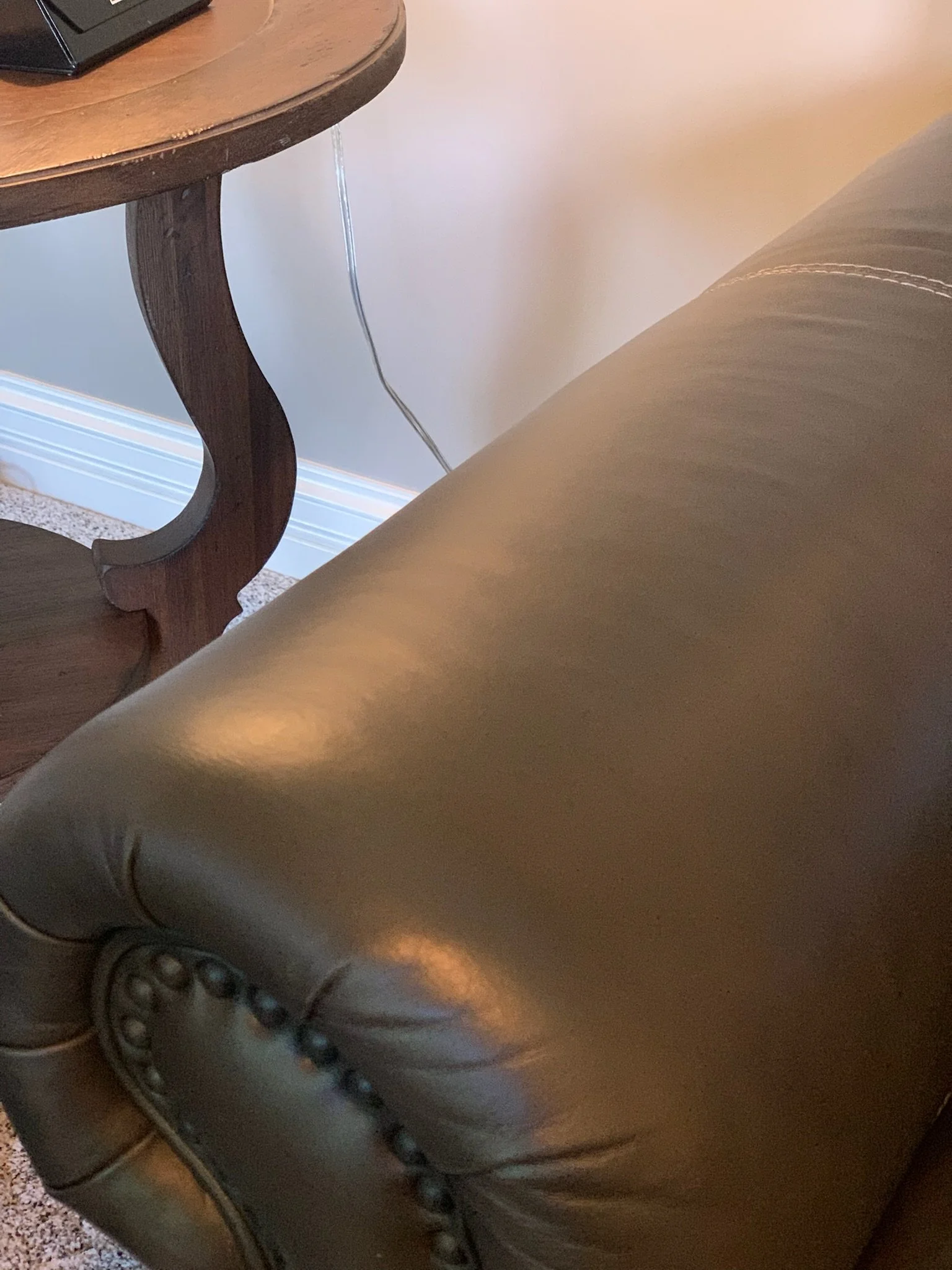 After stripped and extracting the body oils from the leather I am able to clean and repair the area. Work was performed on-site in Oakbrook, Illinois