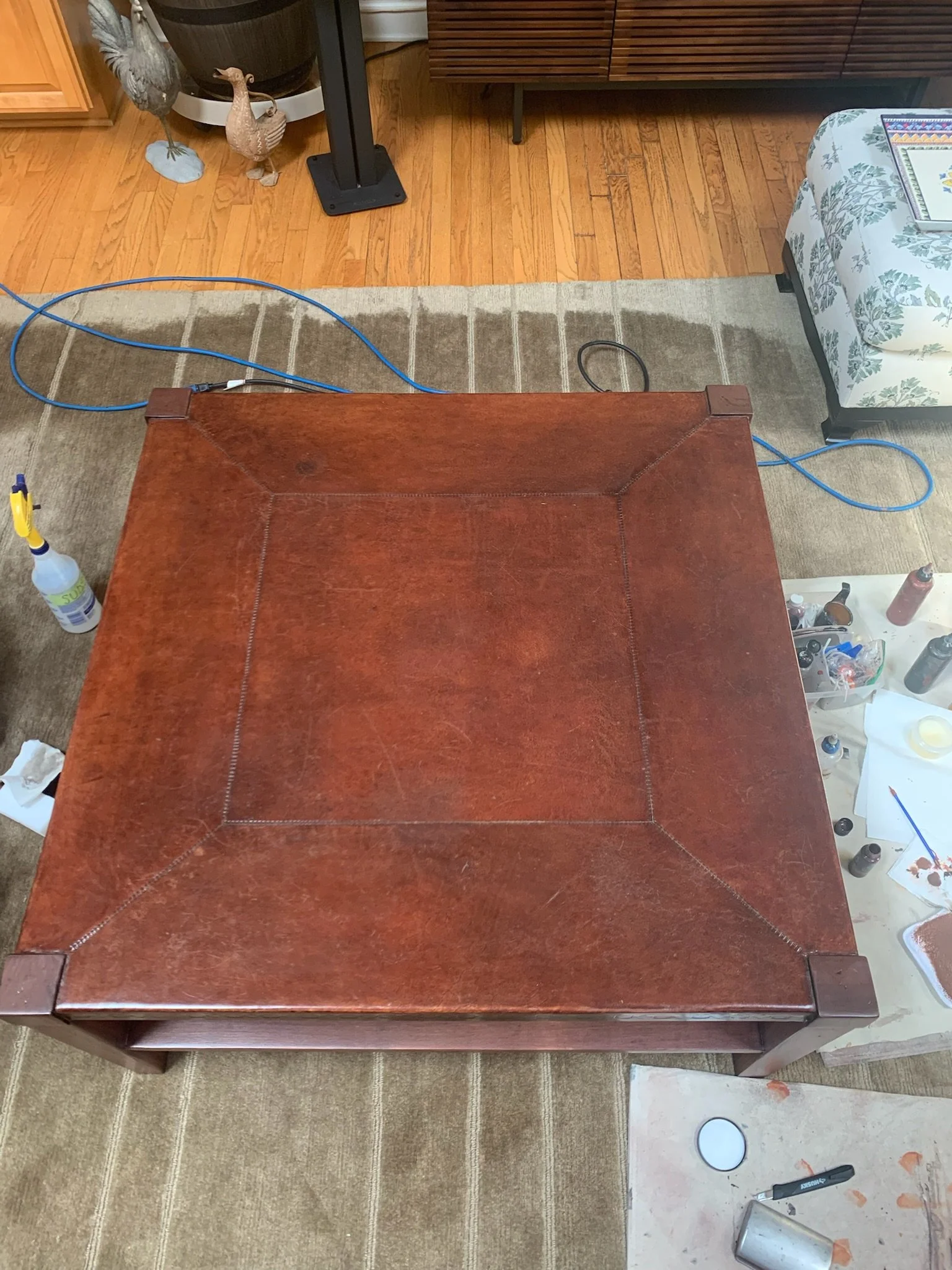 Coffee ring stains removed. Leather coffee table looks like new again. All work performed in home. Customer could use the table right after work was completed. Work completed in Wheaton, IL 