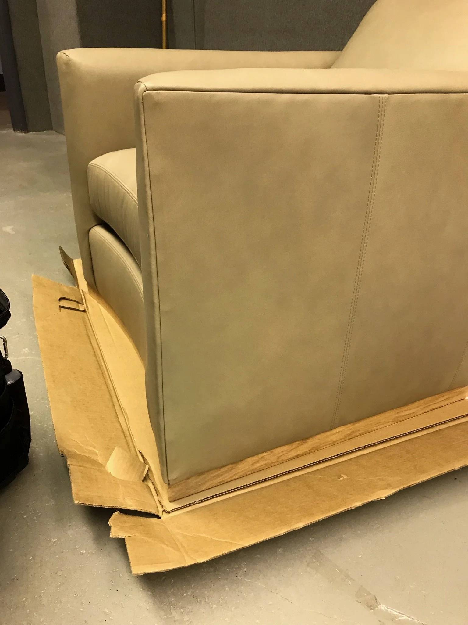 After Photo of moving damage. Chair was repaired in furniture warehouse. Shop was located in Itasca, IL 