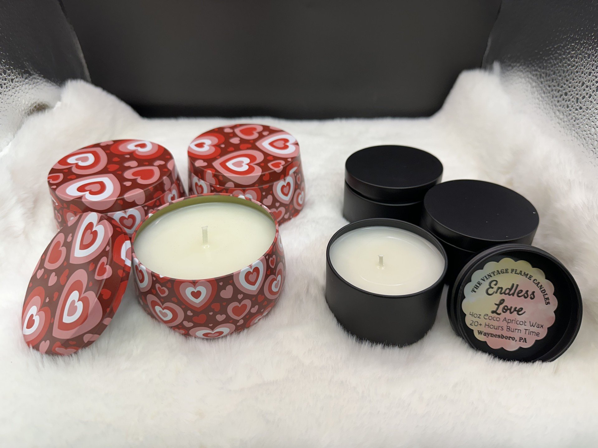 Scented candles in decorative tins