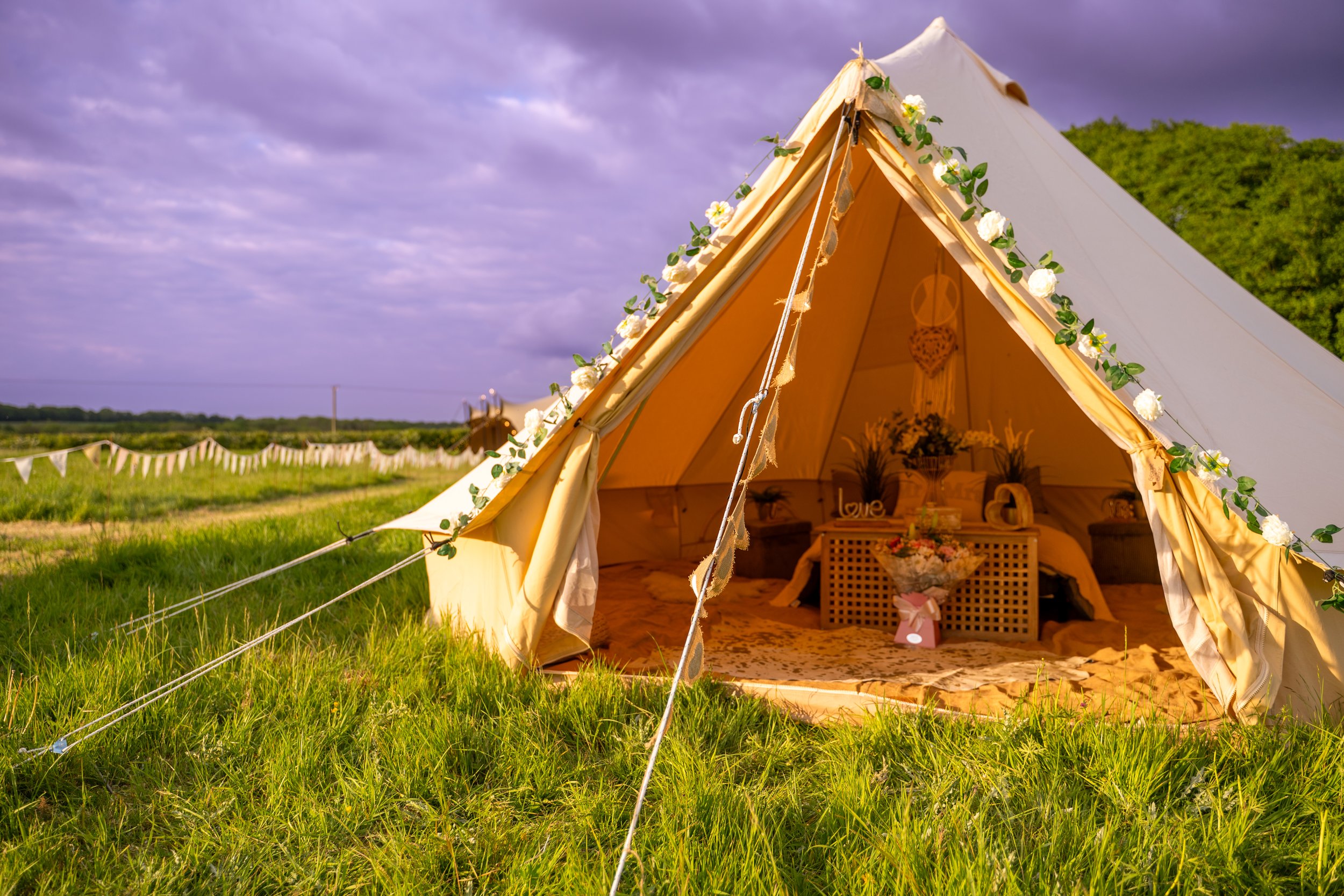 Bell tent with decorations in a field