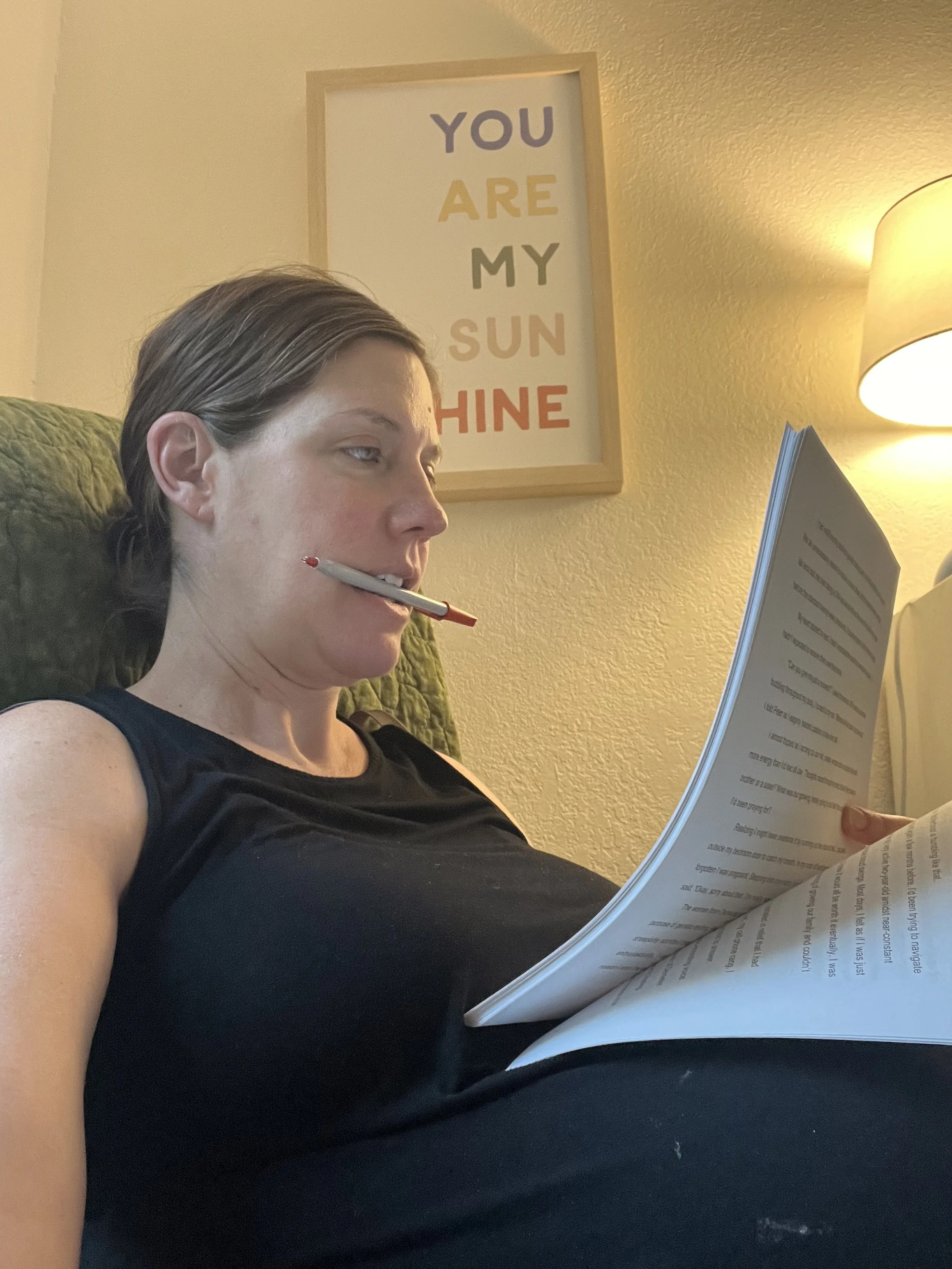 Ashley Heyburn editing the manuscript of Unexpectedly Perfect.