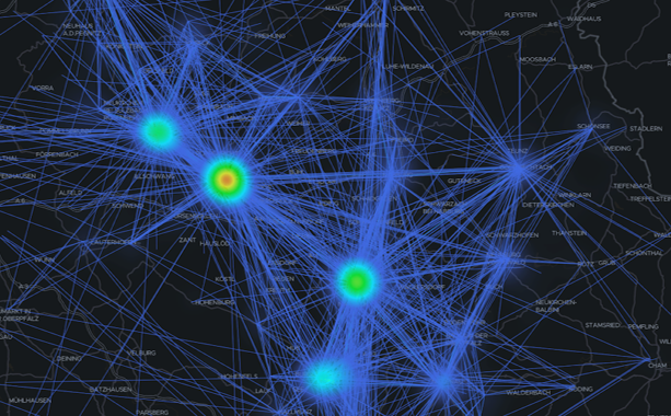A digital map showing interconnected routes or data flows between multiple locations, highlighted with bright blue lines and glowing nodes.
