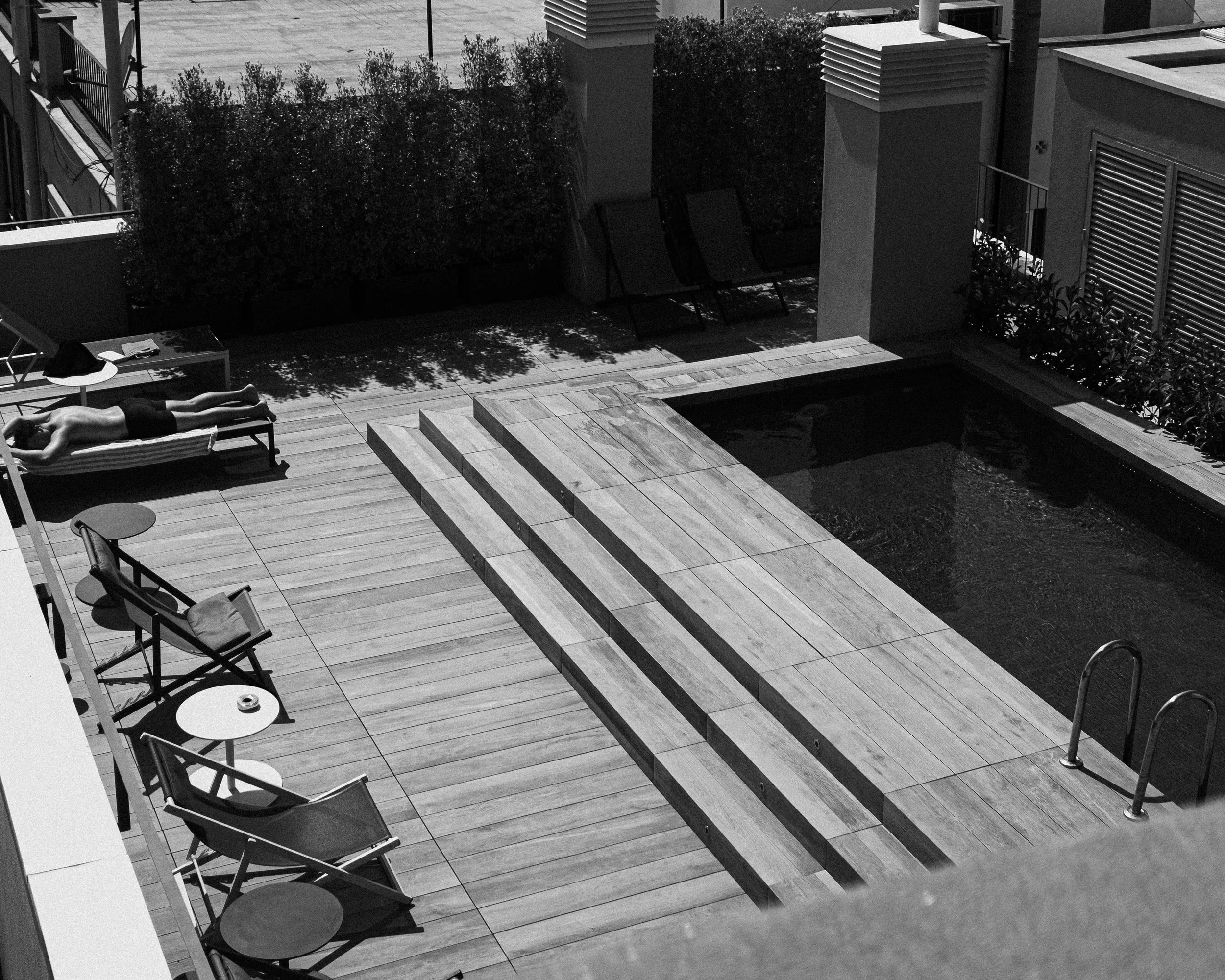 barcelona rooftop guy sunbathing.jpg