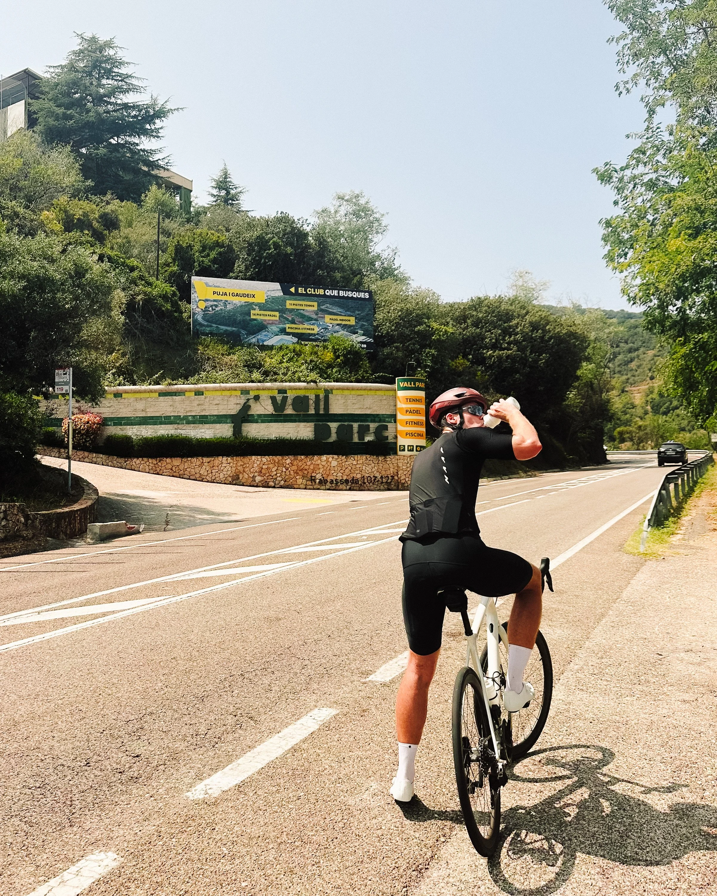 mason on bike drinking.jpg