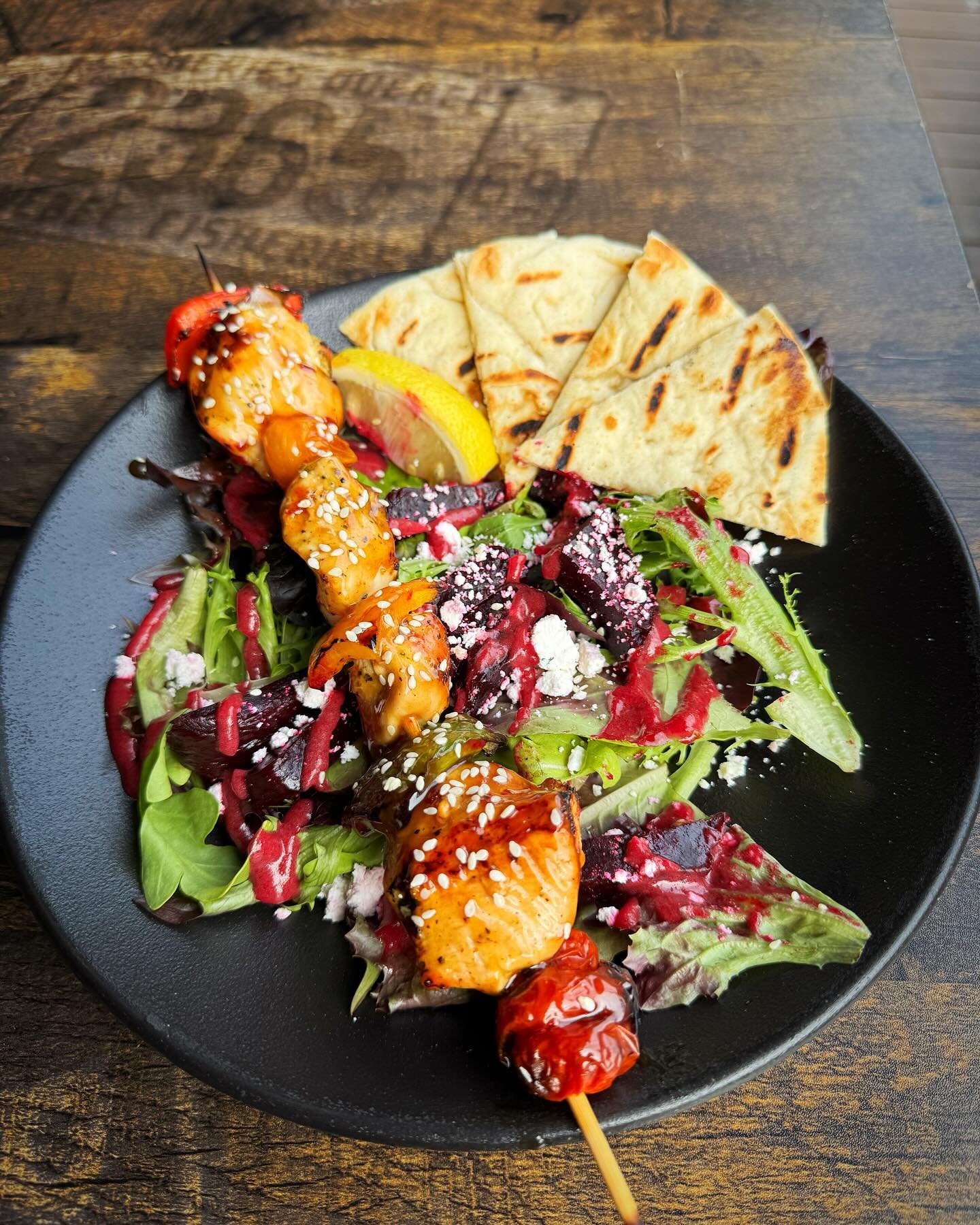 Grilled chicken skewers bursting with color, love, and flavor. Glazed, sprinkled with sesame, and served over fresh greens, feta, beets, and pita bread. Celebrate Pride with every bite. 🌈❤️

Book your reservation through OpenTable, DM, call (613) 54