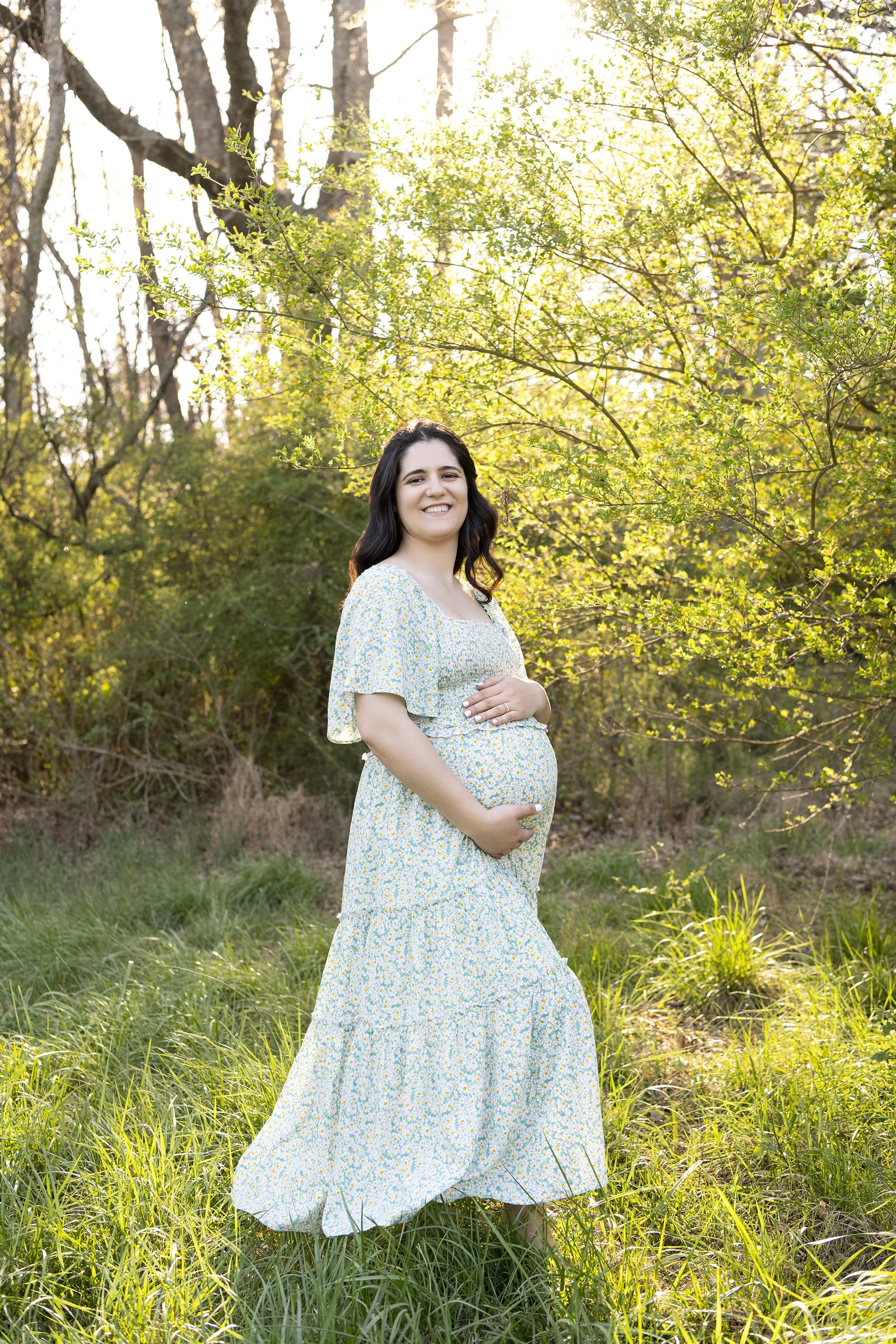 Milton GA maternity photography session featuring Naomi in a natural light outdoor field, lifestyle pregnancy portraits by Atlanta Portrait Co maternity photographer.