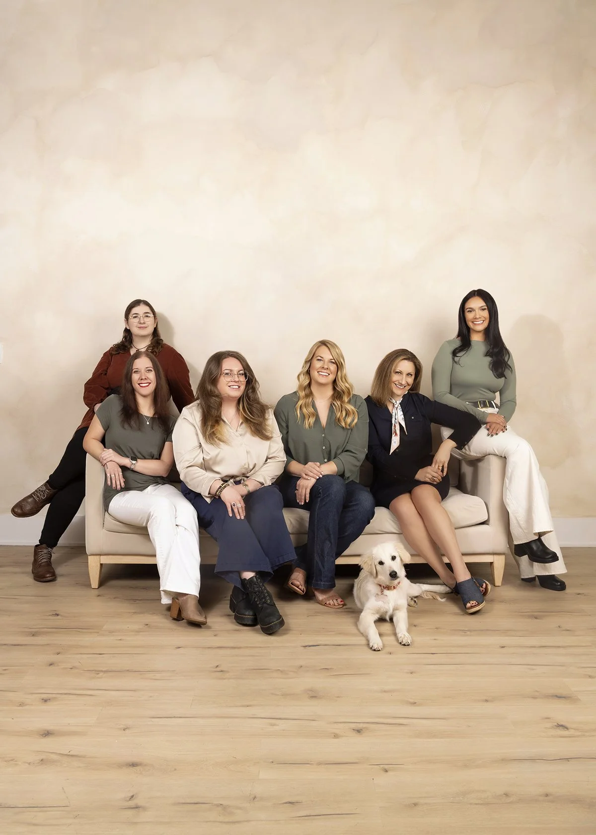 Lifestyle commercial branding group portrait of the Celia Webb LPC & Associates counseling team, photographed at J Bec Studios in Milton, Georgia by Caitlin Tabilog of Atlanta Portrait Co.