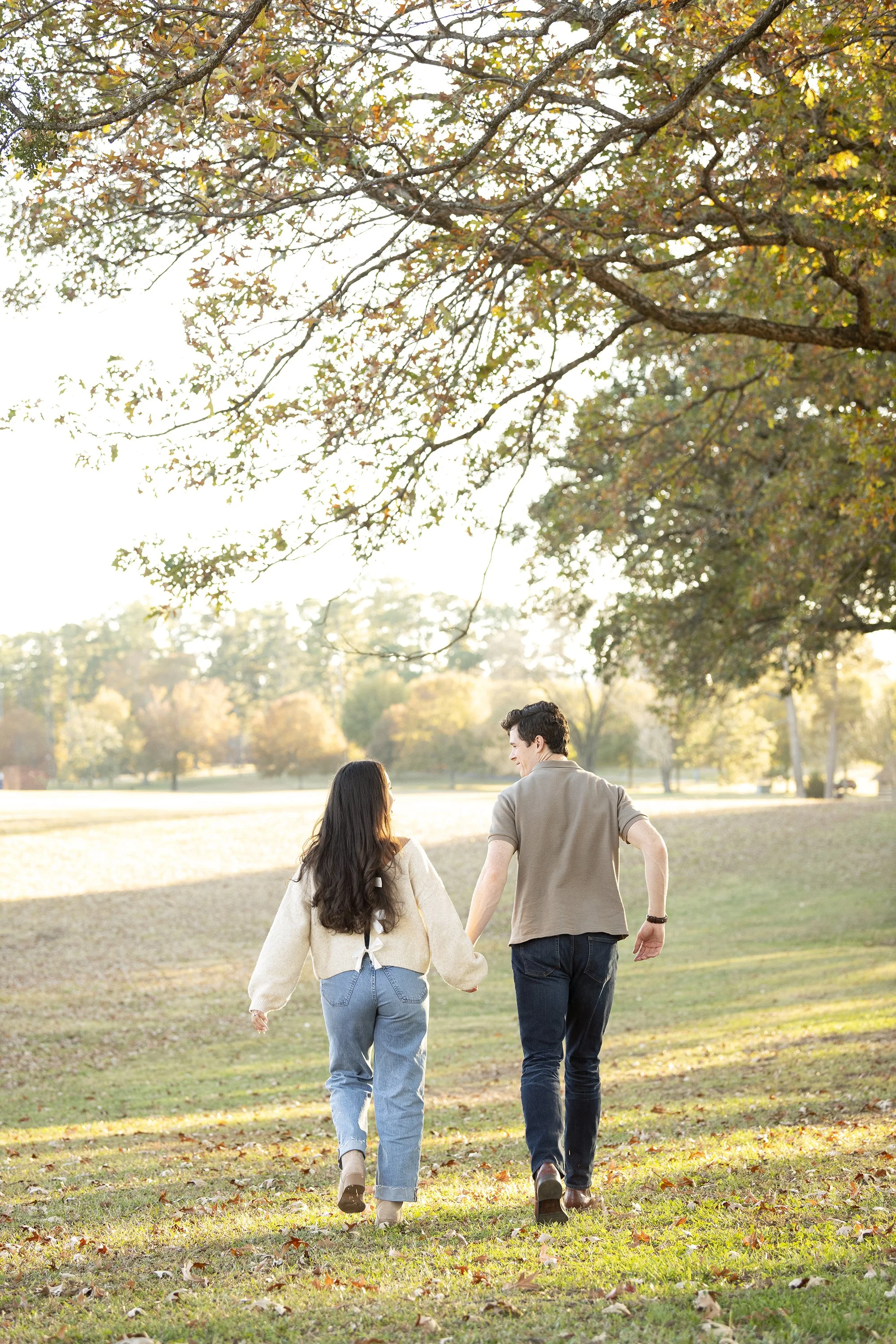 Engagement session of Marshal and Giselle at Berry College in Rome, Georgia, captured with natural light and candid moments by Atlanta portrait photographer Caitlin Tabilog of Atlanta Portrait Co, top engagement and couples photographer in Atlanta.