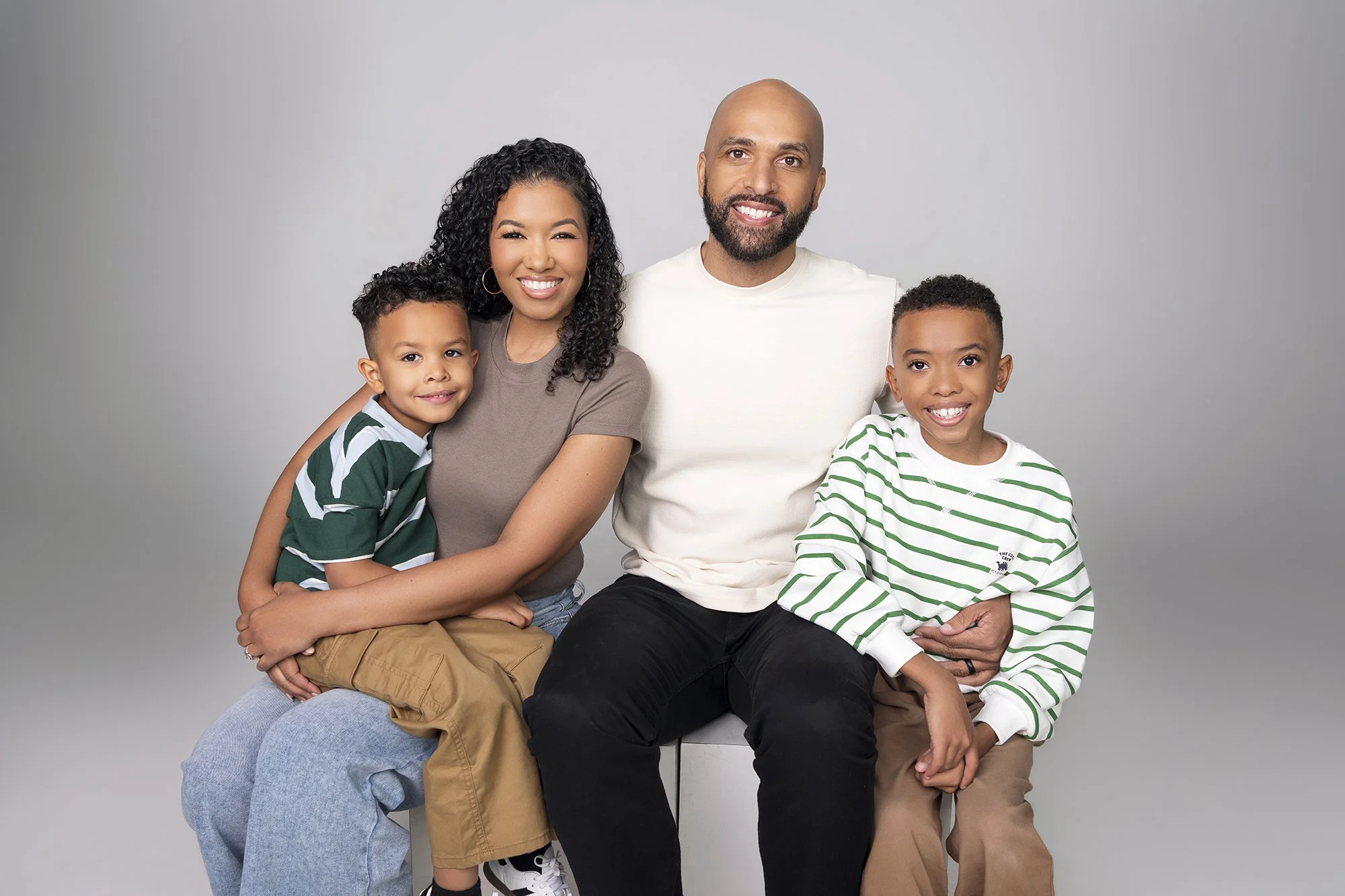 Atlanta portrait family photographer Caitlin Tabilog capturing lifestyle studio family session of Sada Jackson and family with Forward The Agency, joyful smiling candid moments, editorial fashion-inspired family photography Atlanta GA