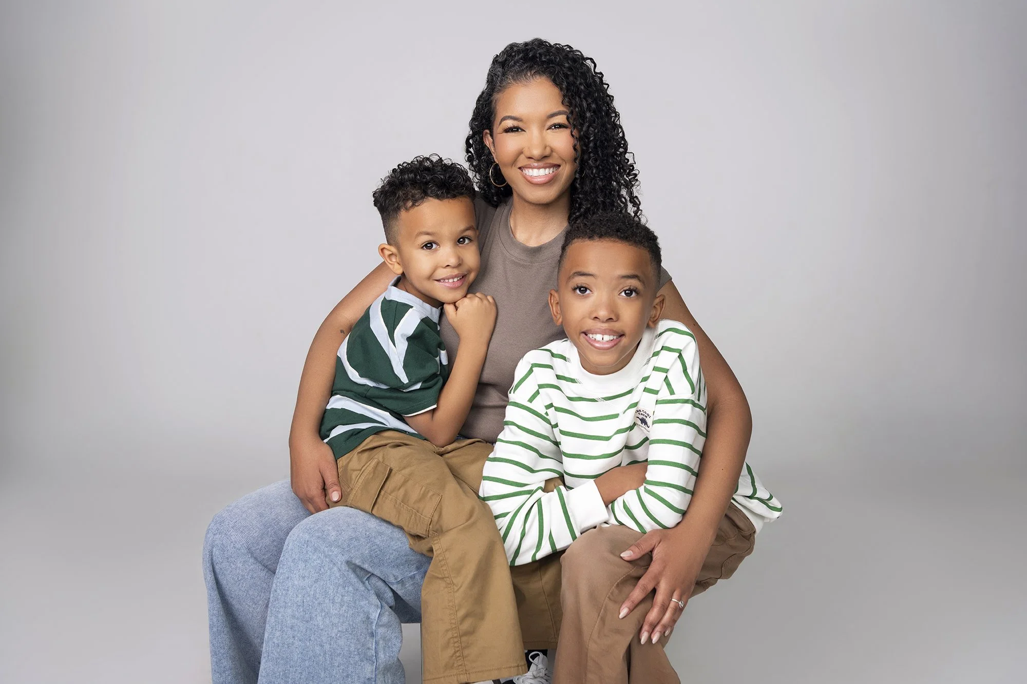Professional Atlanta portrait photographer Caitlin Tabilog lifestyle family studio photography of Sada Jackson and her family Forward the Agency smiling and laughing editorial fashion catalog