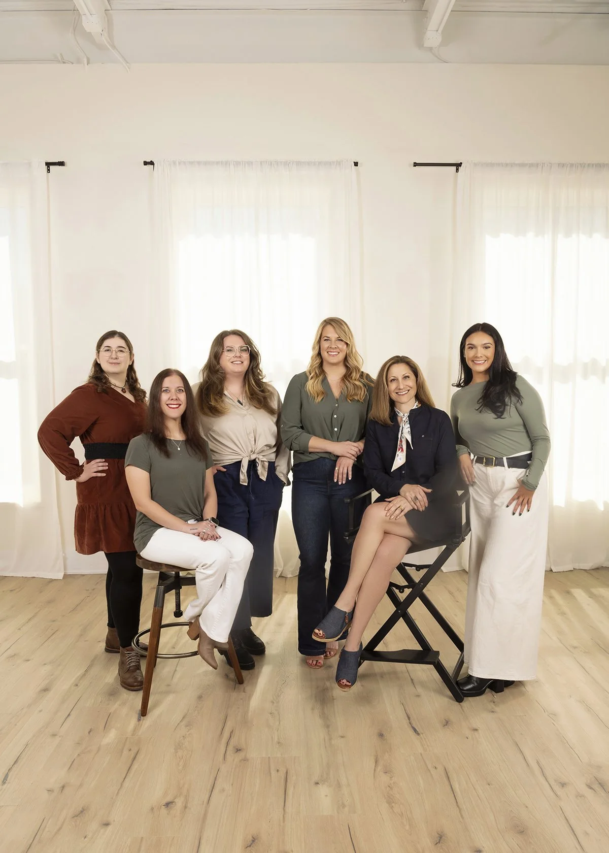 Professional branding group portrait of Celia Webb and her therapy staff at Celia Webb LPC & Associates, an Atlanta-based counseling practice offering in-person and online therapy, photographed by Caitlin Tabilog.