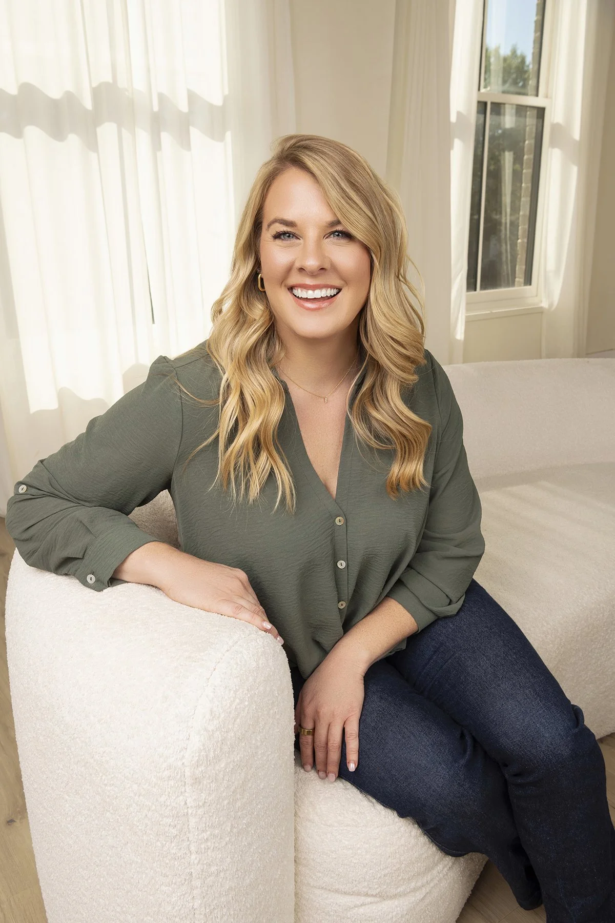 Lifestyle commercial branding portrait of Celia Webb, LPC, owner of Celia Webb LPC & Associates, photographed in studio at J Bec Studios in Milton, Georgia by Caitlin Tabilog of Atlanta Portrait Co, Atlanta branding photographer.