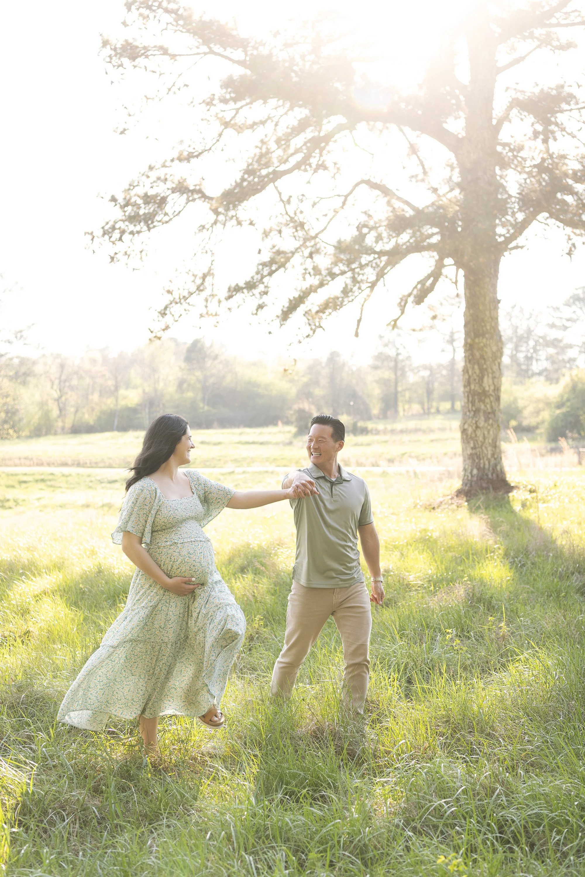 Natural light maternity photography in Atlanta, GA featuring Naomi’s outdoor spring field session. Luxury maternity portraits by Atlanta Portrait Co serving Woodstock, Alpharetta, Roswell, and Milton.