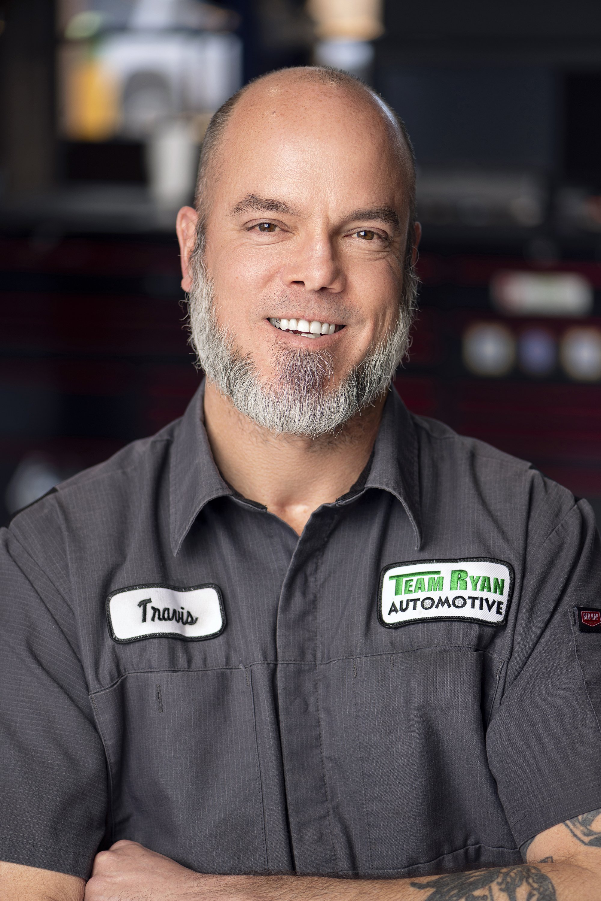 Business team member professional headshot taken during an on-location corporate headshot session at Team Ryan Automotive in Cumming, Georgia by Atlanta portrait photographer Caitlin Tabilog.