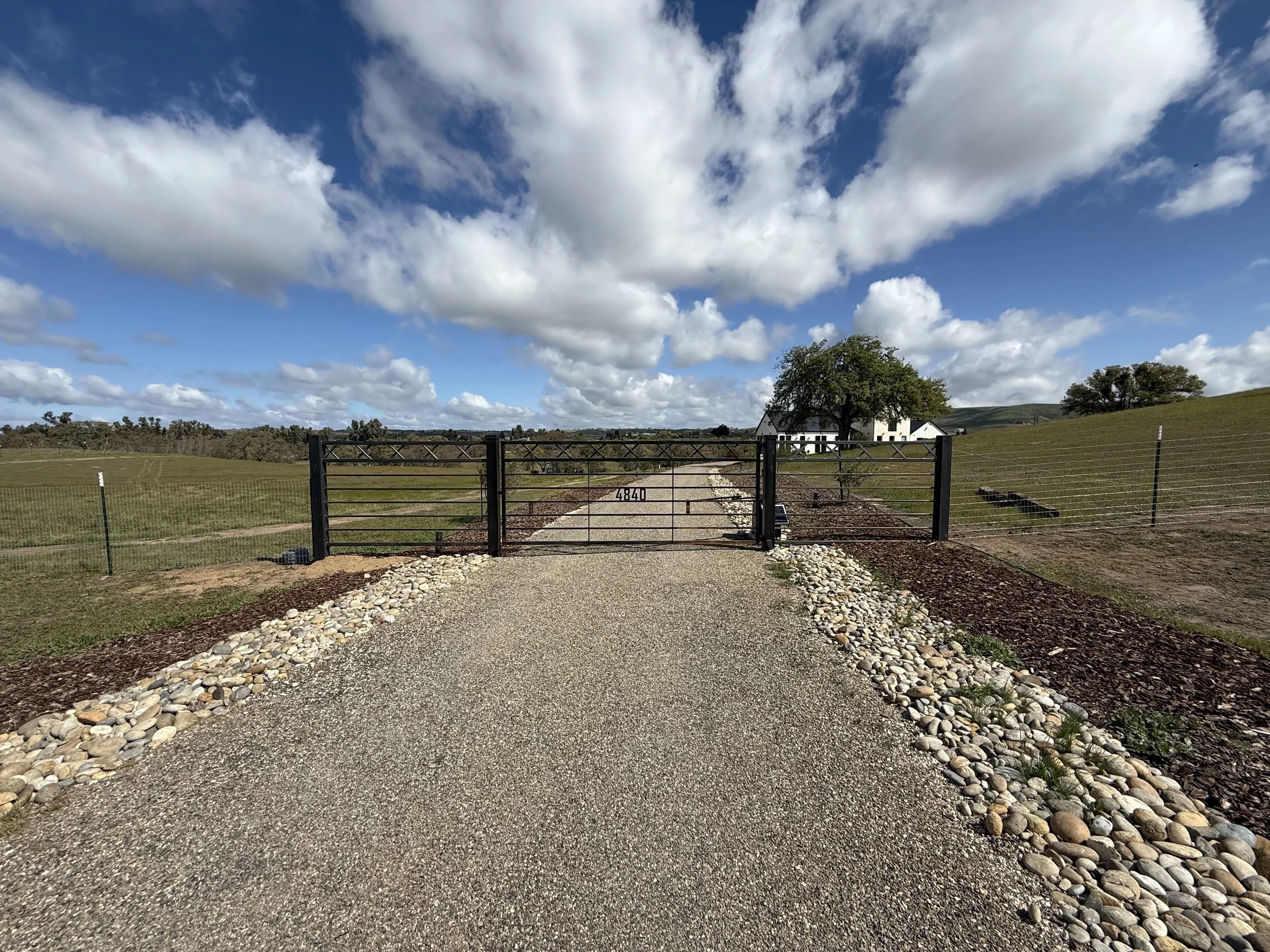 Custom wings coming off a gate creston