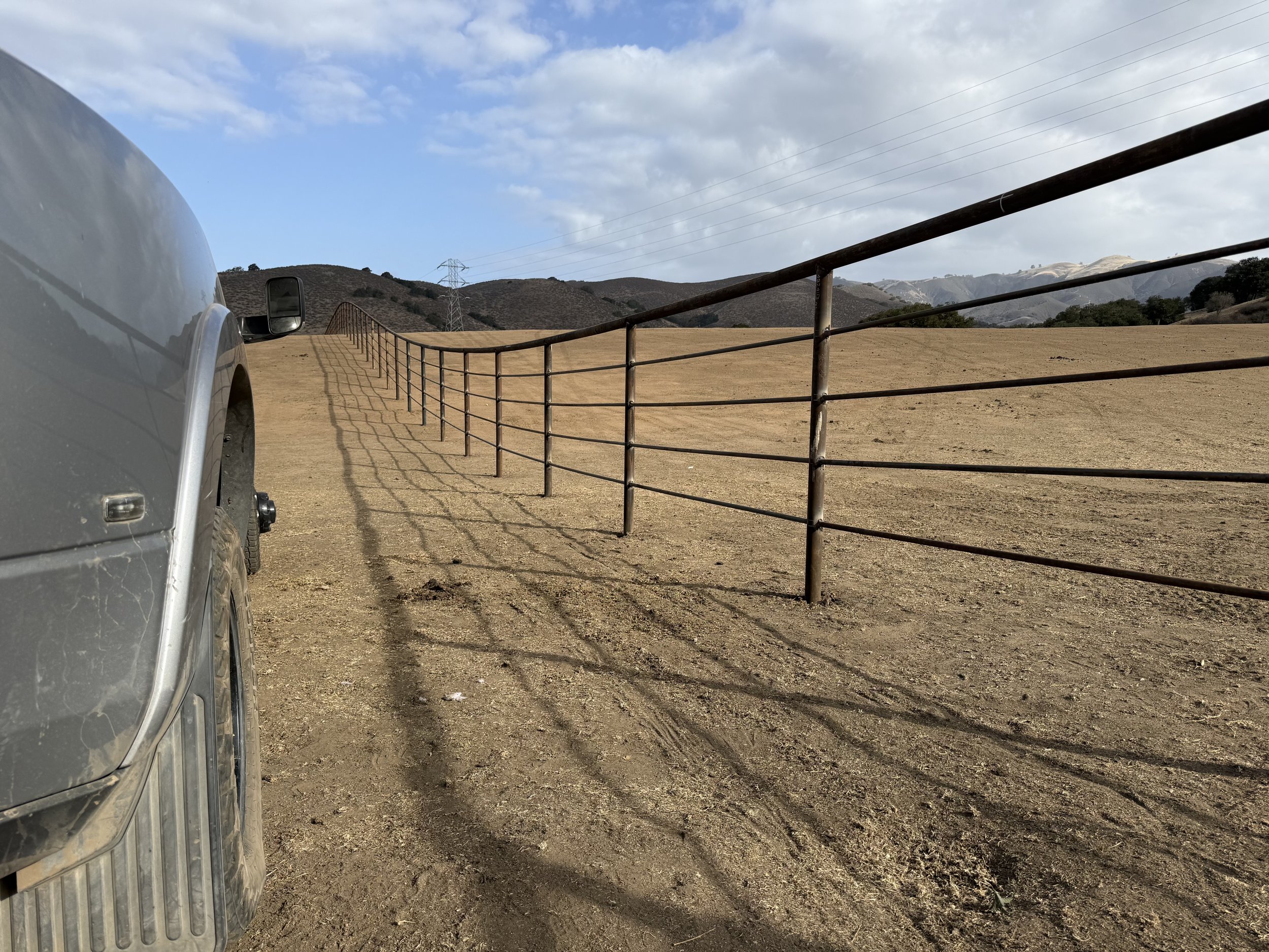 Pipe fence top rail sucker rod
