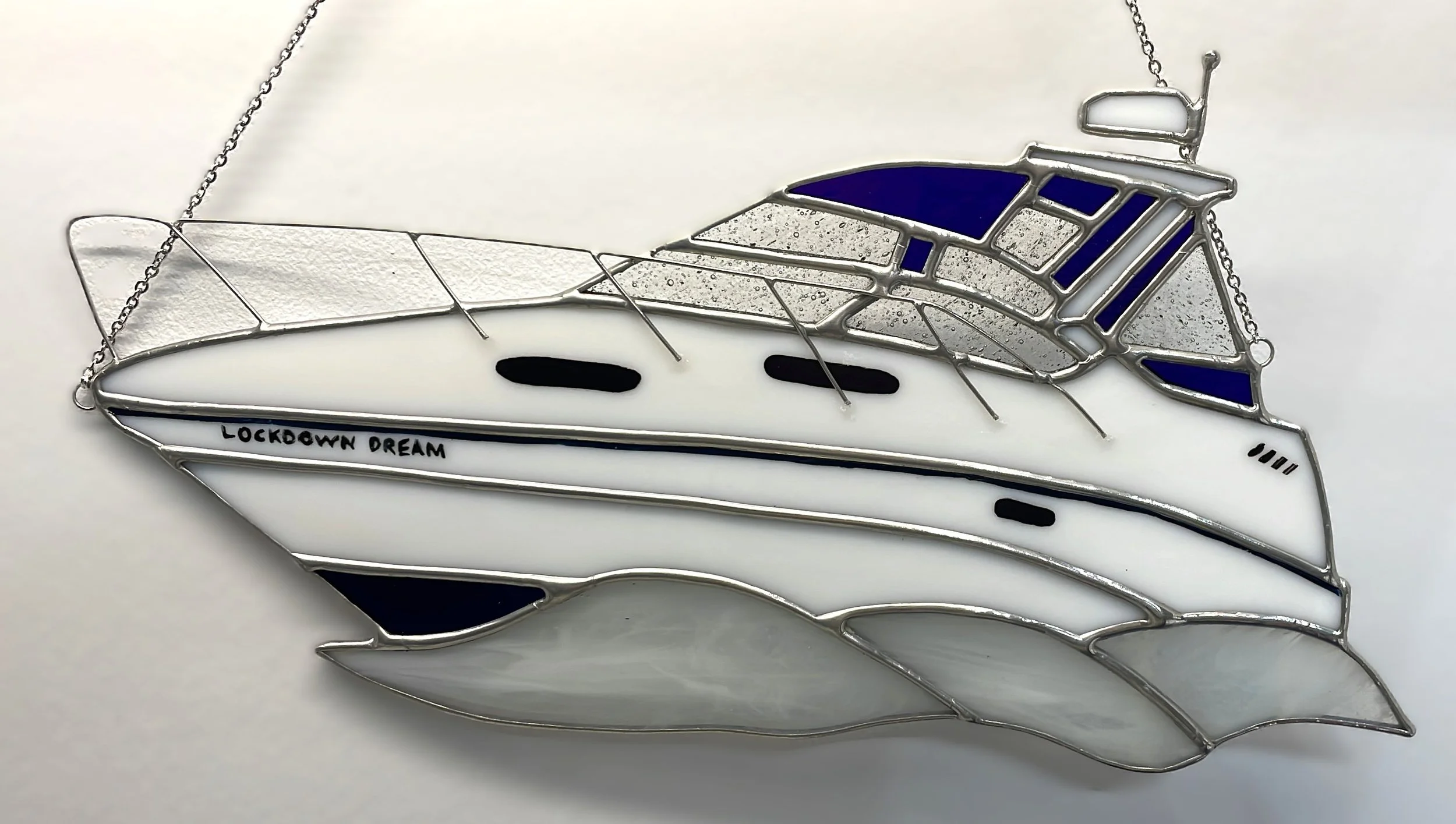 Motor Yacht depicted in stained glass. Another commission completed by Crafted Colours.