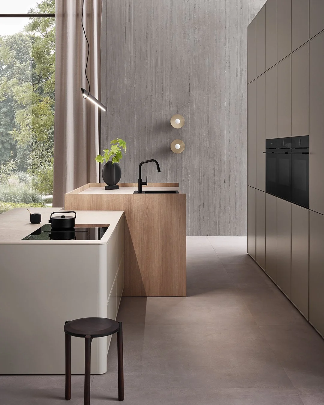 Modern kitchen with light wood and gray cabinetry, black fixtures, and a large window with curtains showing greenery outside.