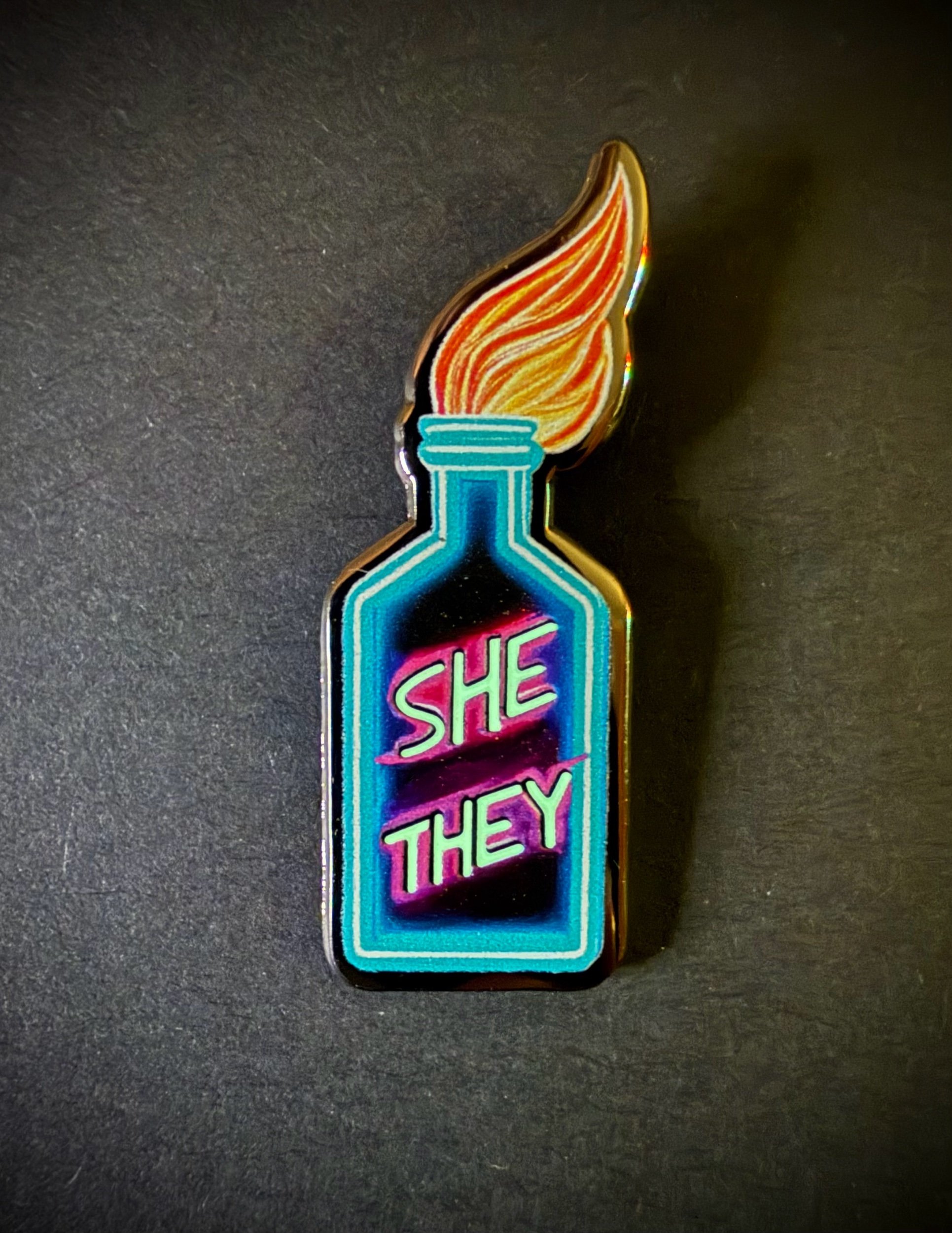 She / They