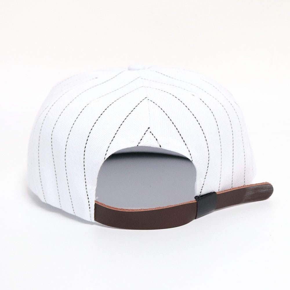 Back view of a white baseball cap with black pinstripes and a brown adjustable strap.