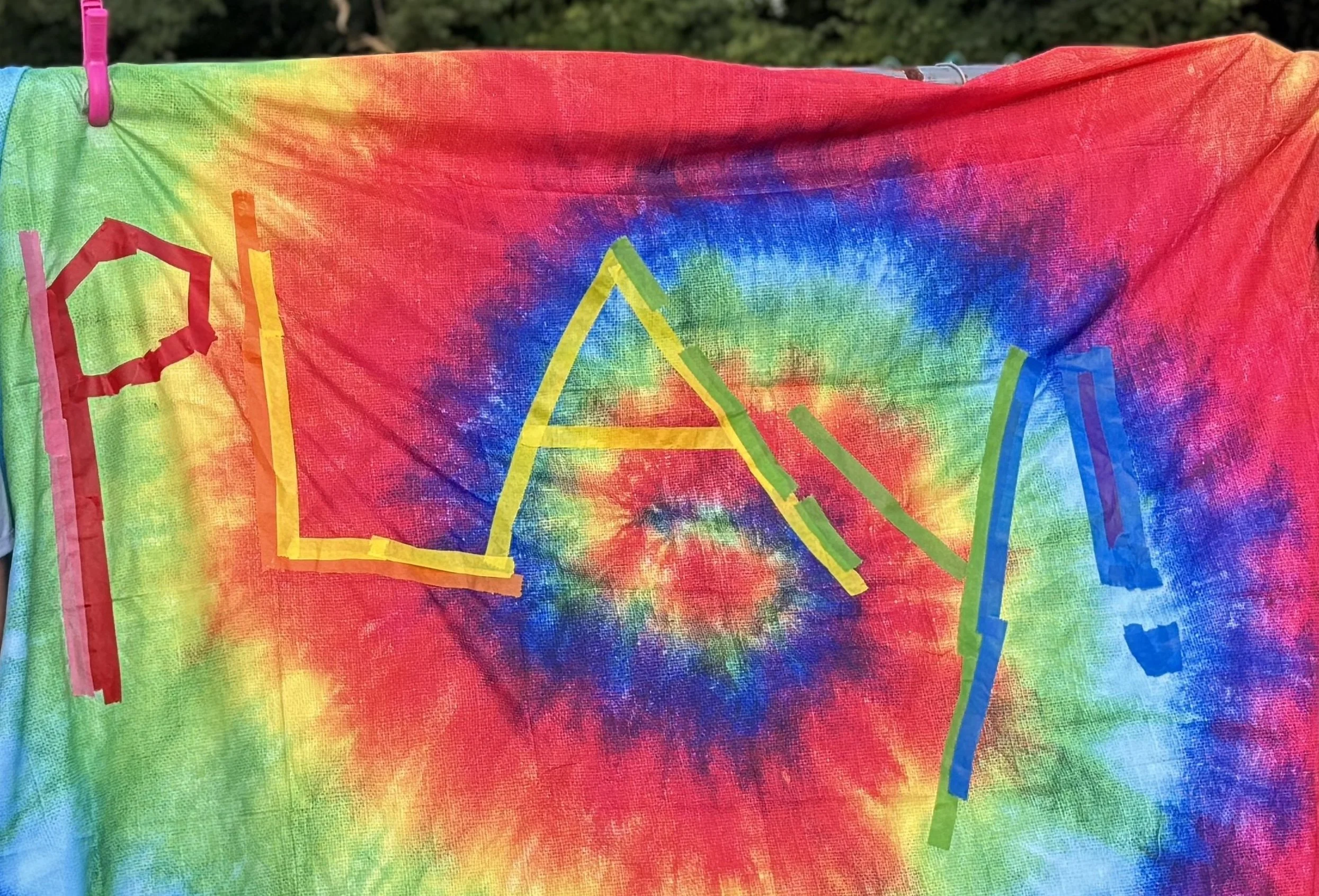 Image of Play Days tie dyed PLAY flag.