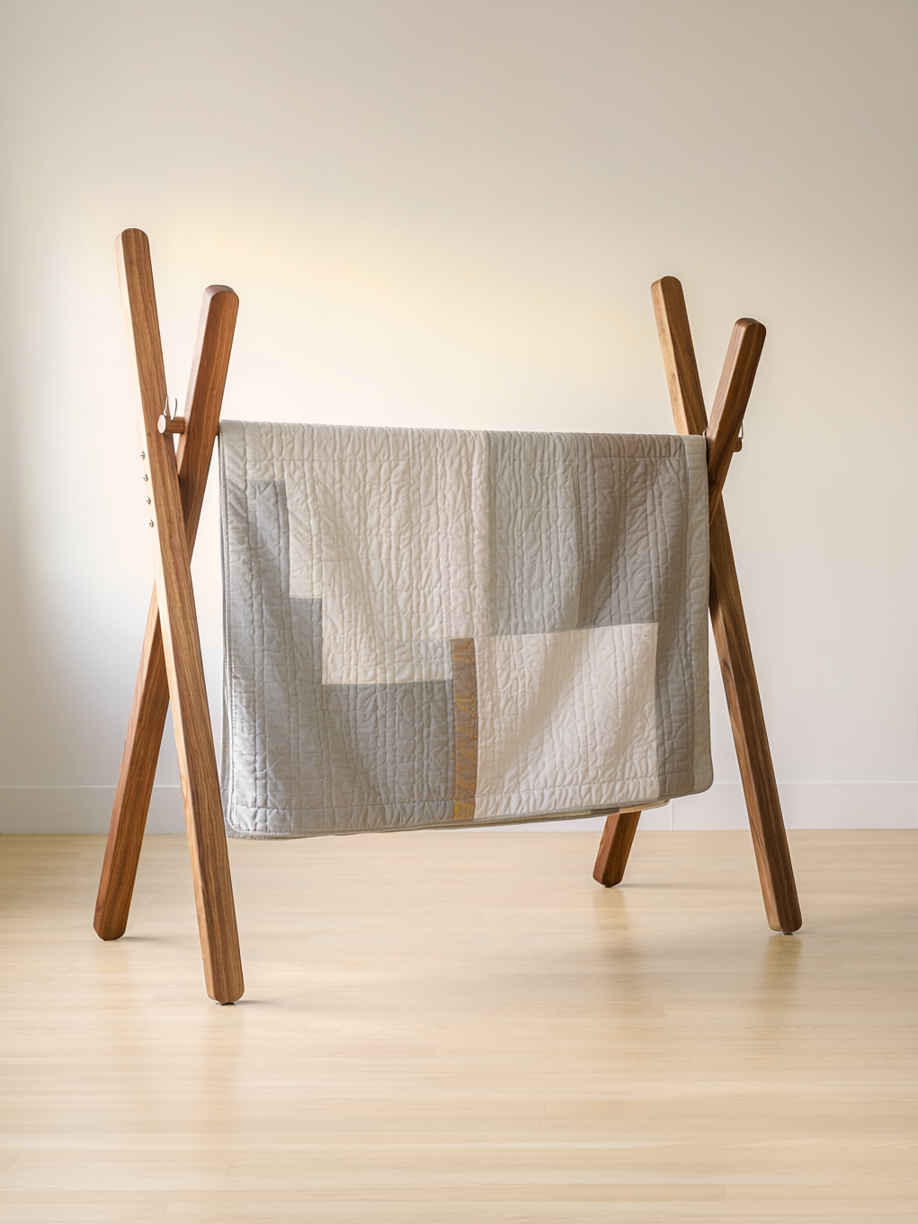 Firefly_Modern Quilt hanging by the corners from a freestanding walnut wood stand, in an empt 786315.png