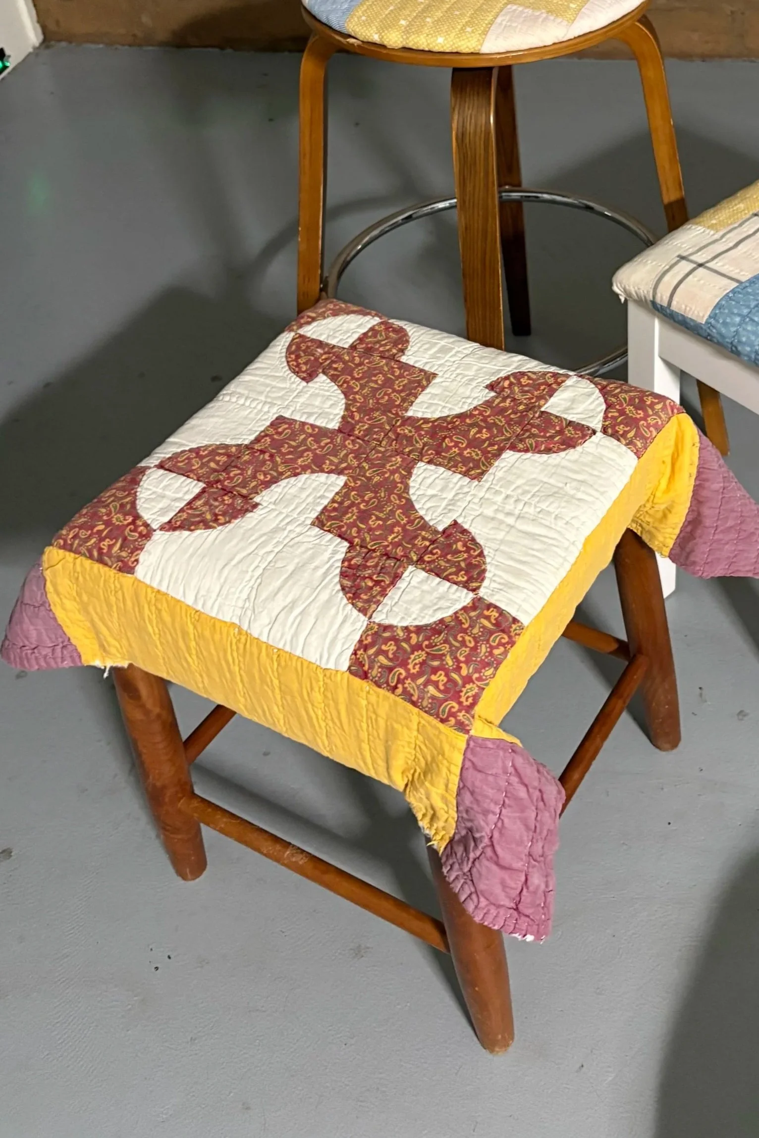 Maroon and Yellow Throwing Star Quilt Foot Stool