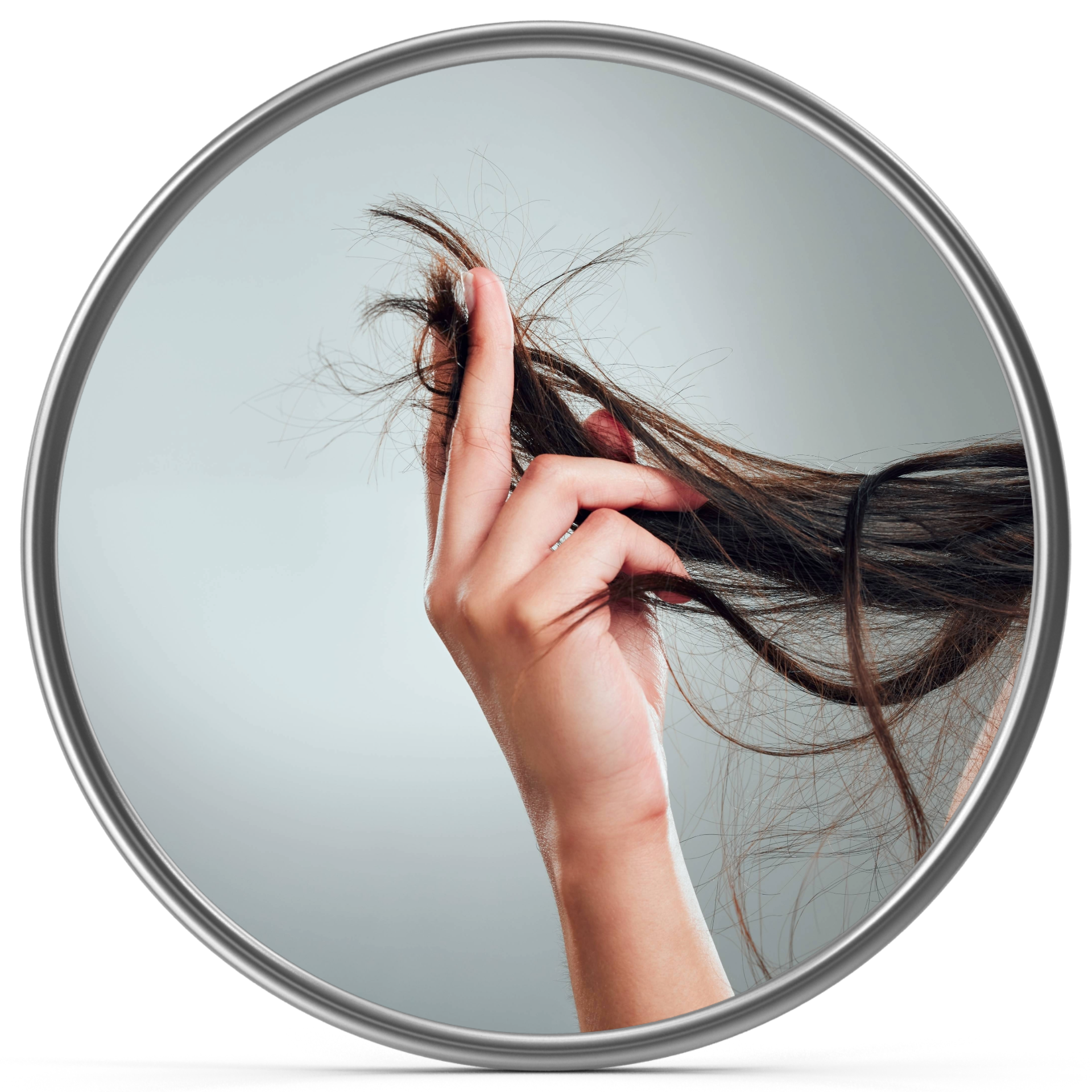 Close-up of a hand holding a tangled bunch of brown hair with a silver mirror frame around the image.