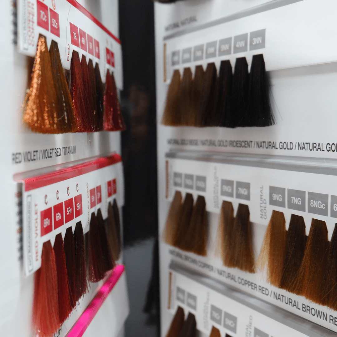 Close-up of hair color swatches on a display board.