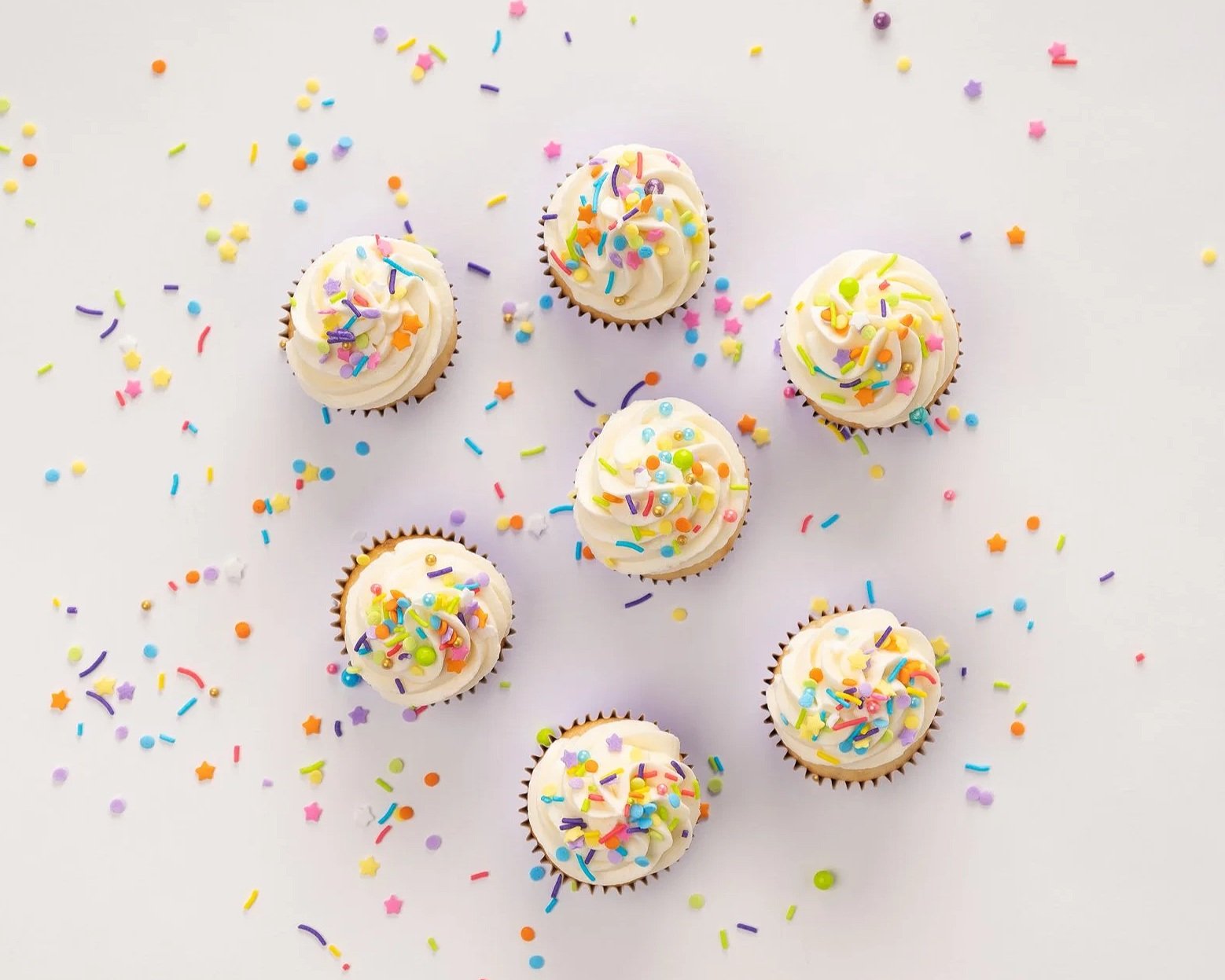 vanilla cupcakes with sprinkles