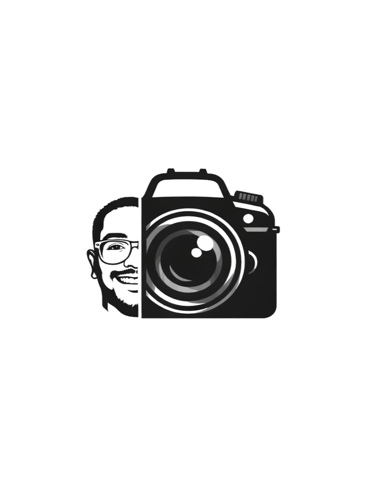 An image of a professional digital camera with a large lens, a viewfinder, and various buttons.