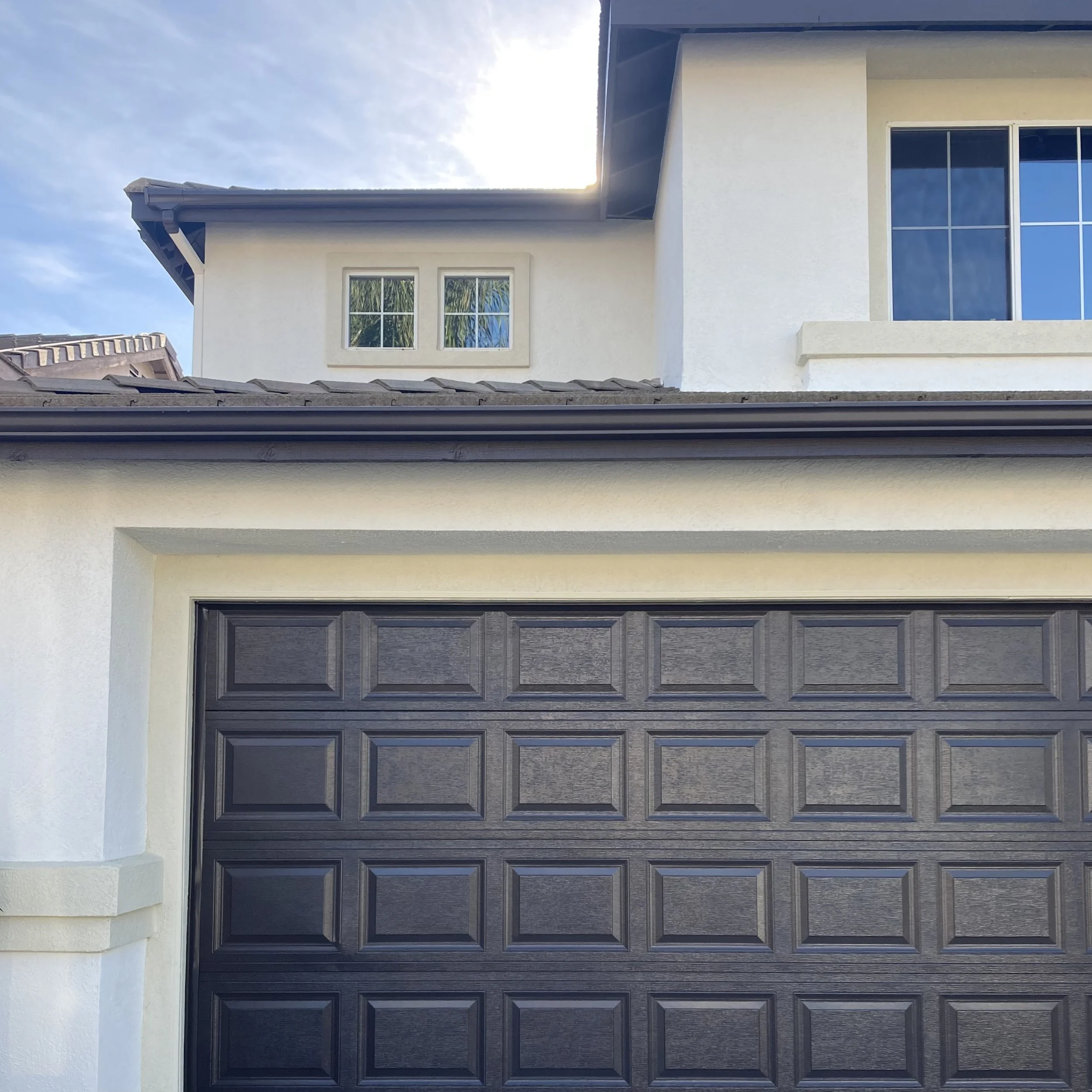 Exterior neutral warm color scheme painted by Garrett Dalton Inc