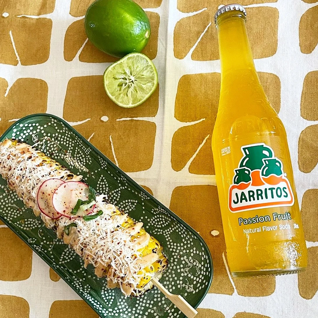 A combination made by the Mexican flavour Gods&hellip;sweet chargrilled corn with queso fresco, chipotle mayo, more cheese + tajin chase it with sips of a chilled passionfruit jarrito.  See you soon, we are open for lunch + dinner!